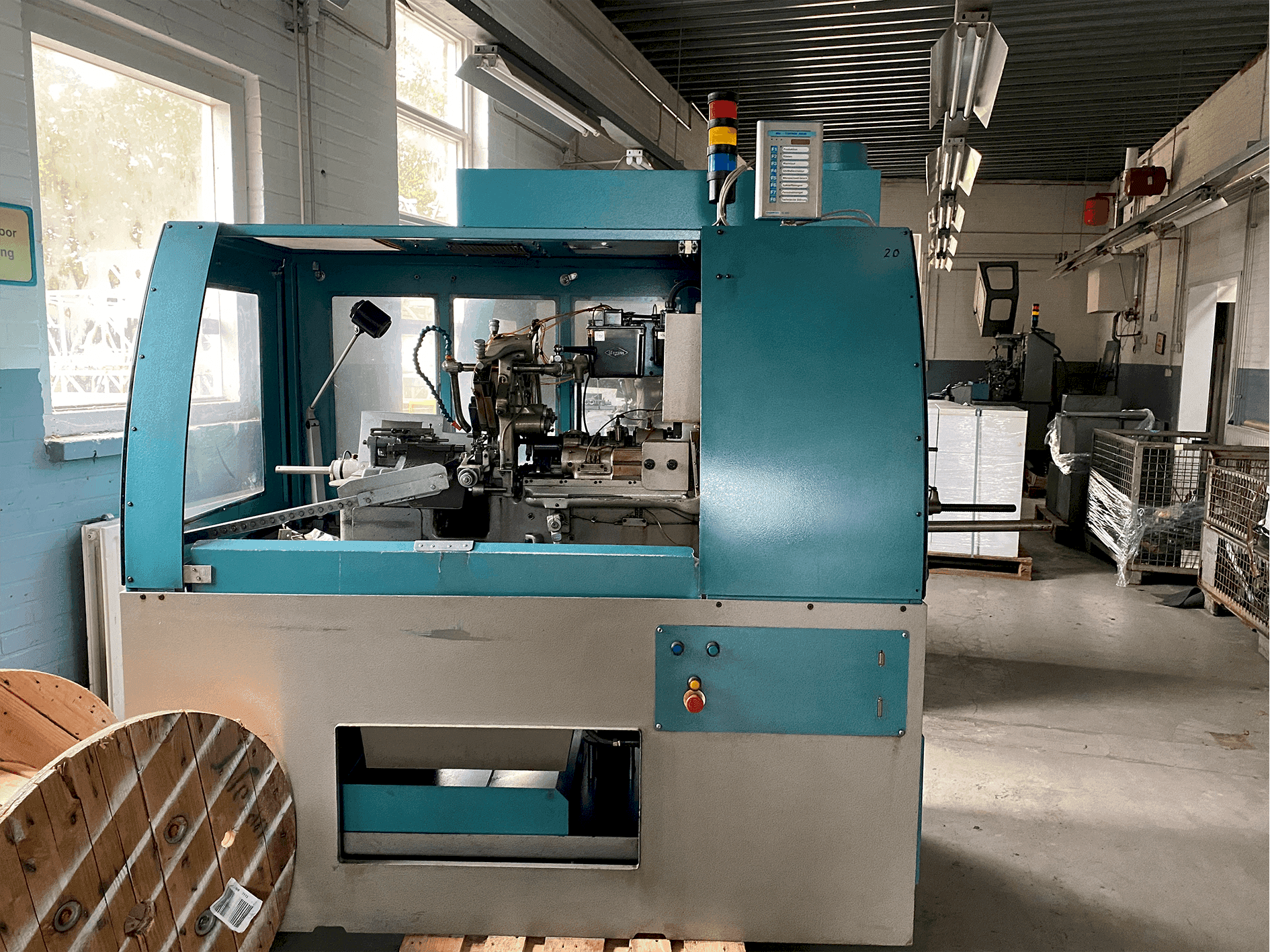 Вид станка Tornos-Bechler NAT-125 vario спереди