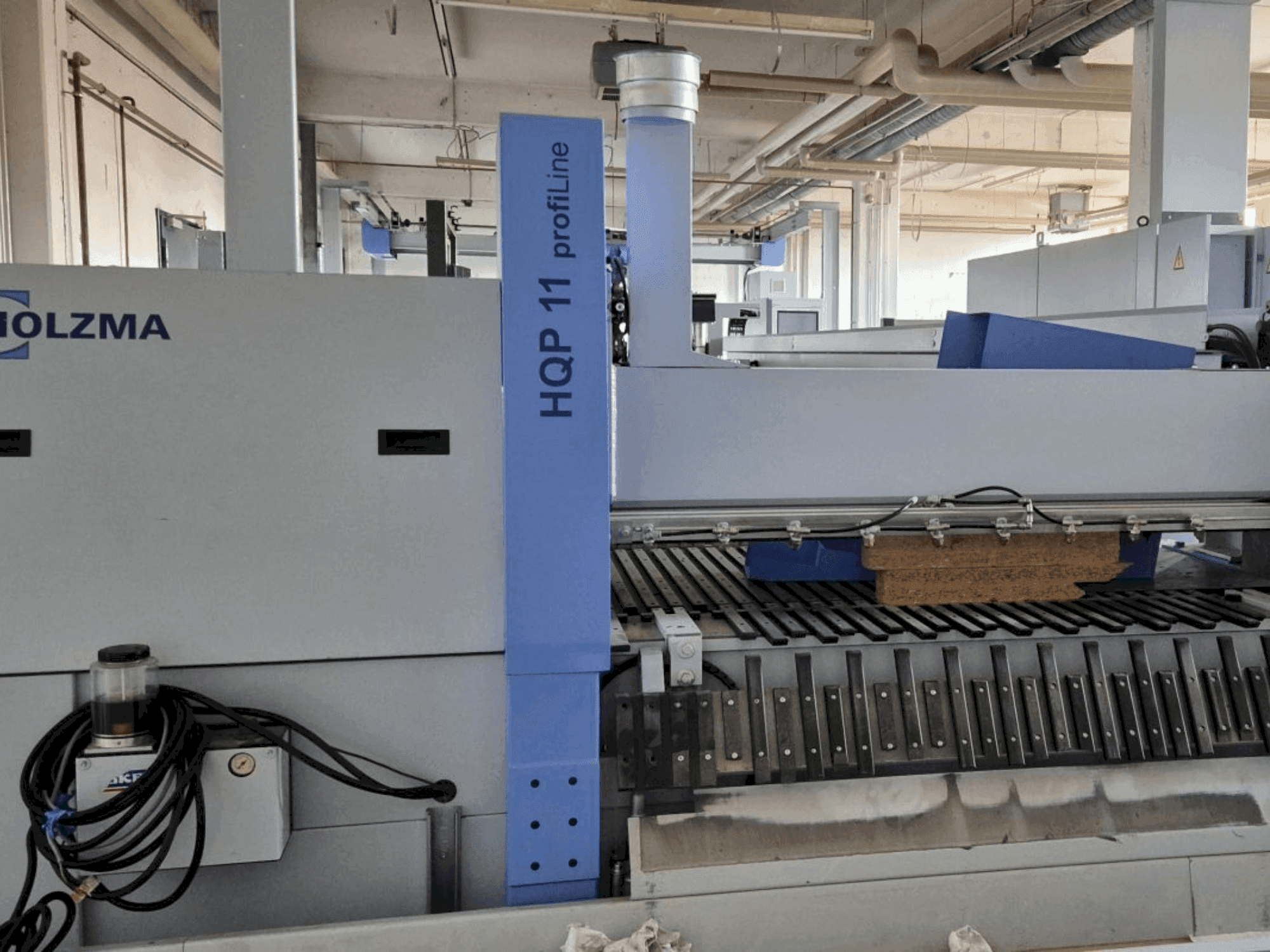 Вид станка HOLZMA PROFI HQP 11/16/56/L/X  спереди