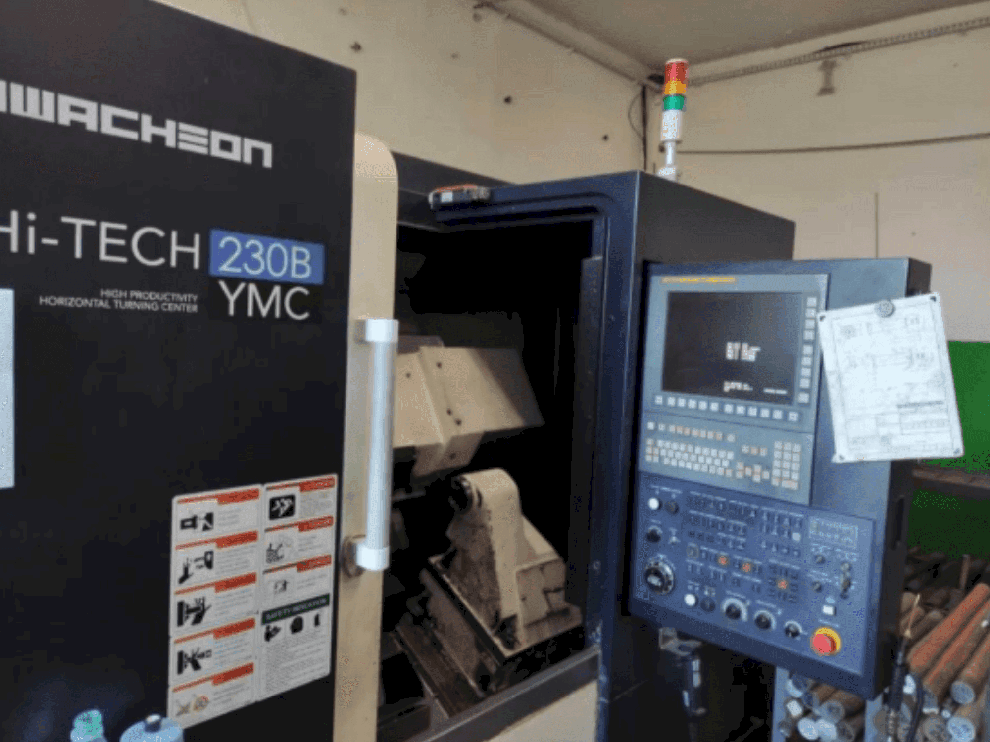 Вид станка HWACHEON HI-TECH 230B YMC  спереди
