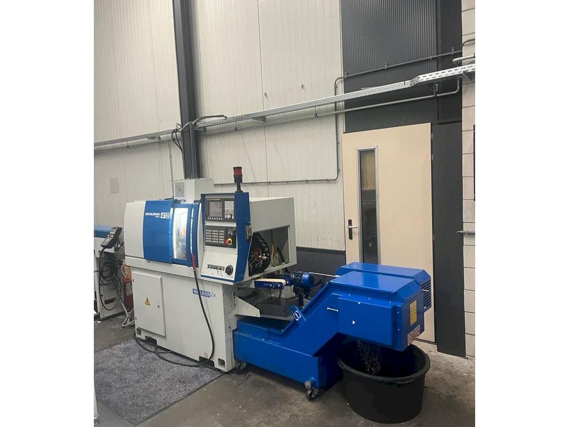 Вид станка Manurhin K'MX 413 спереди