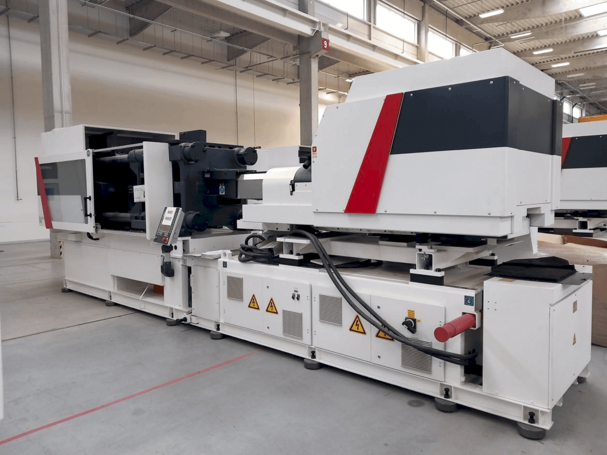 Вид станка Milacron Elektron Evo 350  спереди