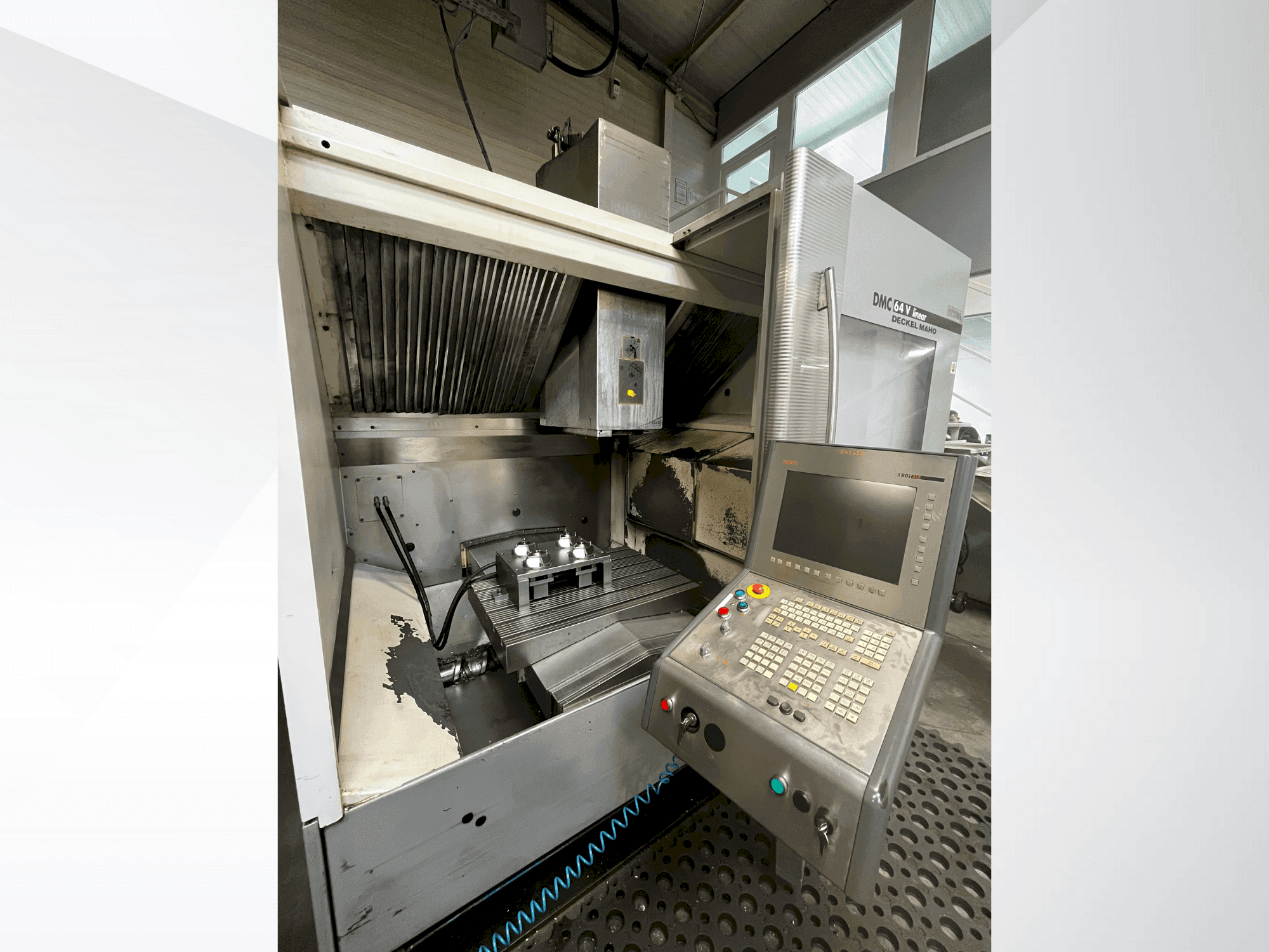 Вид станка DMG DECKEL MAHO DMC 64V linear спереди
