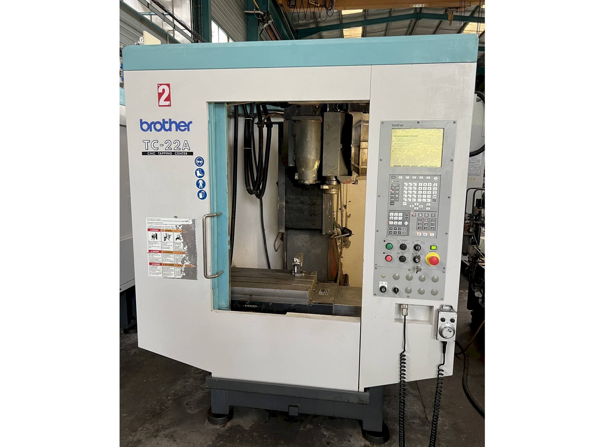 Вид станка Brother TC-22A  спереди