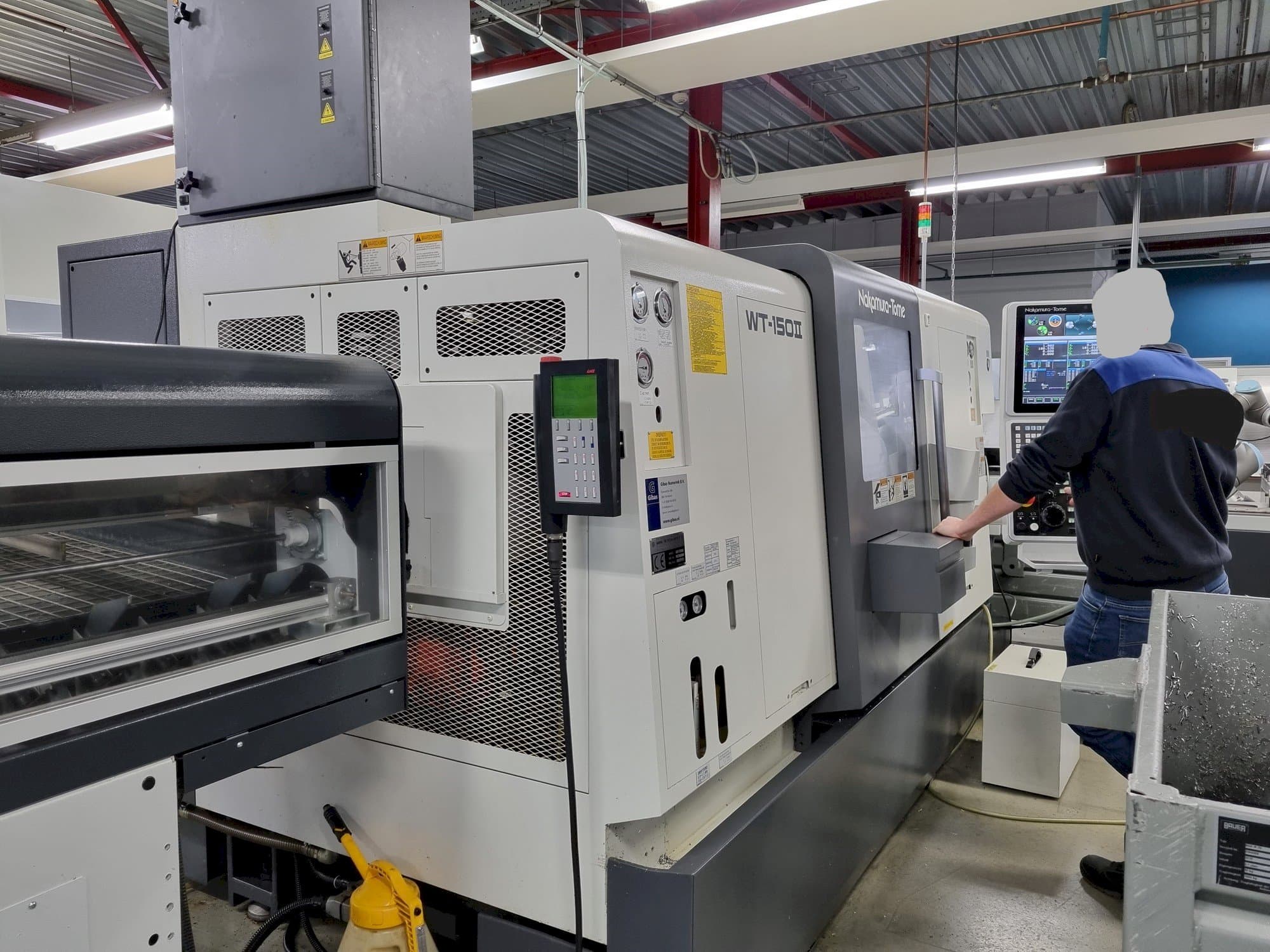 Вид станка NAKAMURA-TOME WT-150II спереди