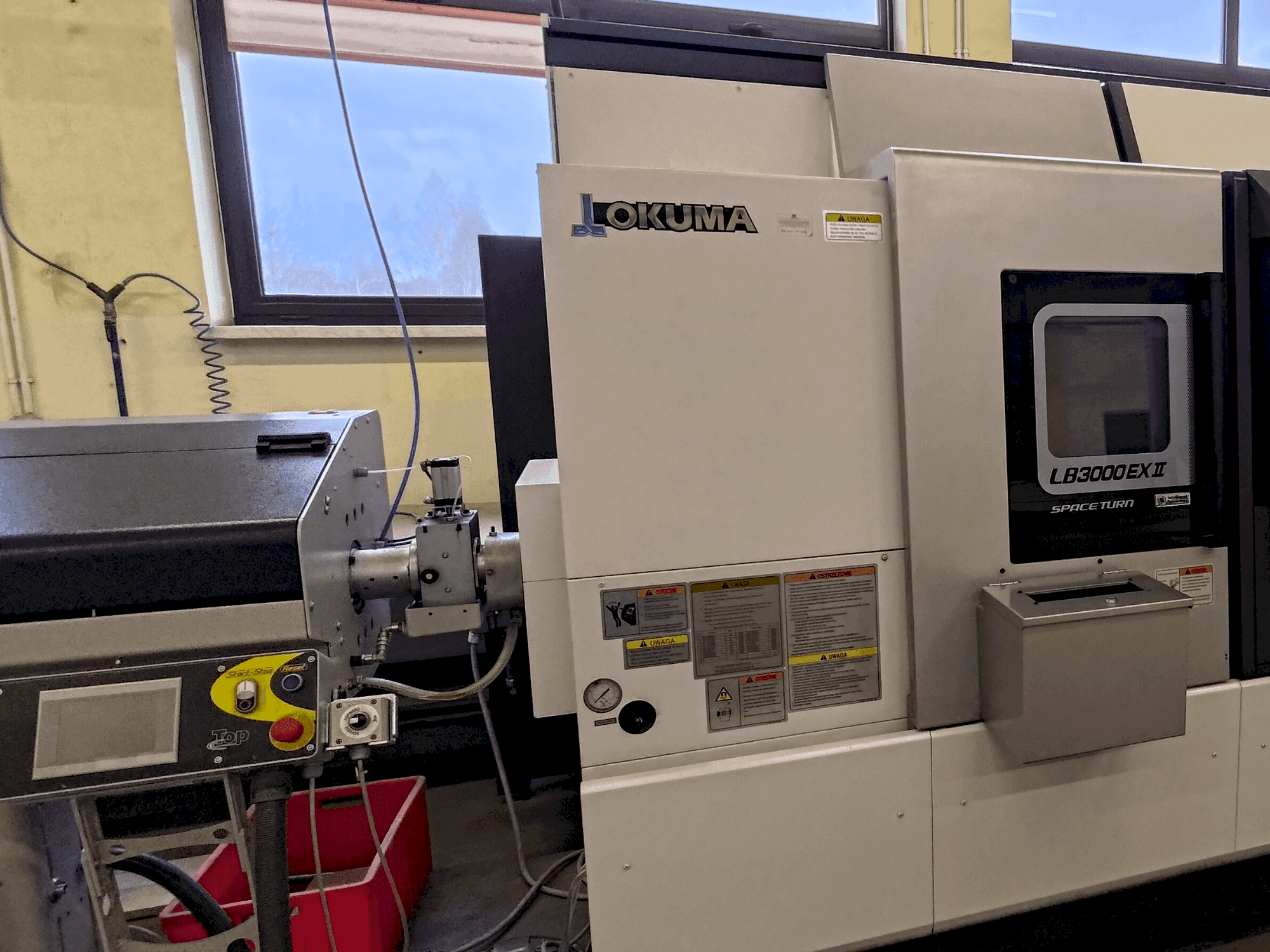 Вид станка Okuma LB 3000 EXII MYW 450  спереди