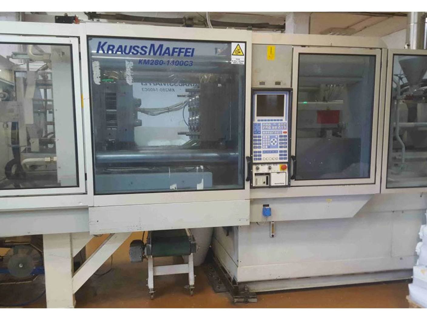 Вид станка Krauss Maffei KM 280-1400 C3 спереди