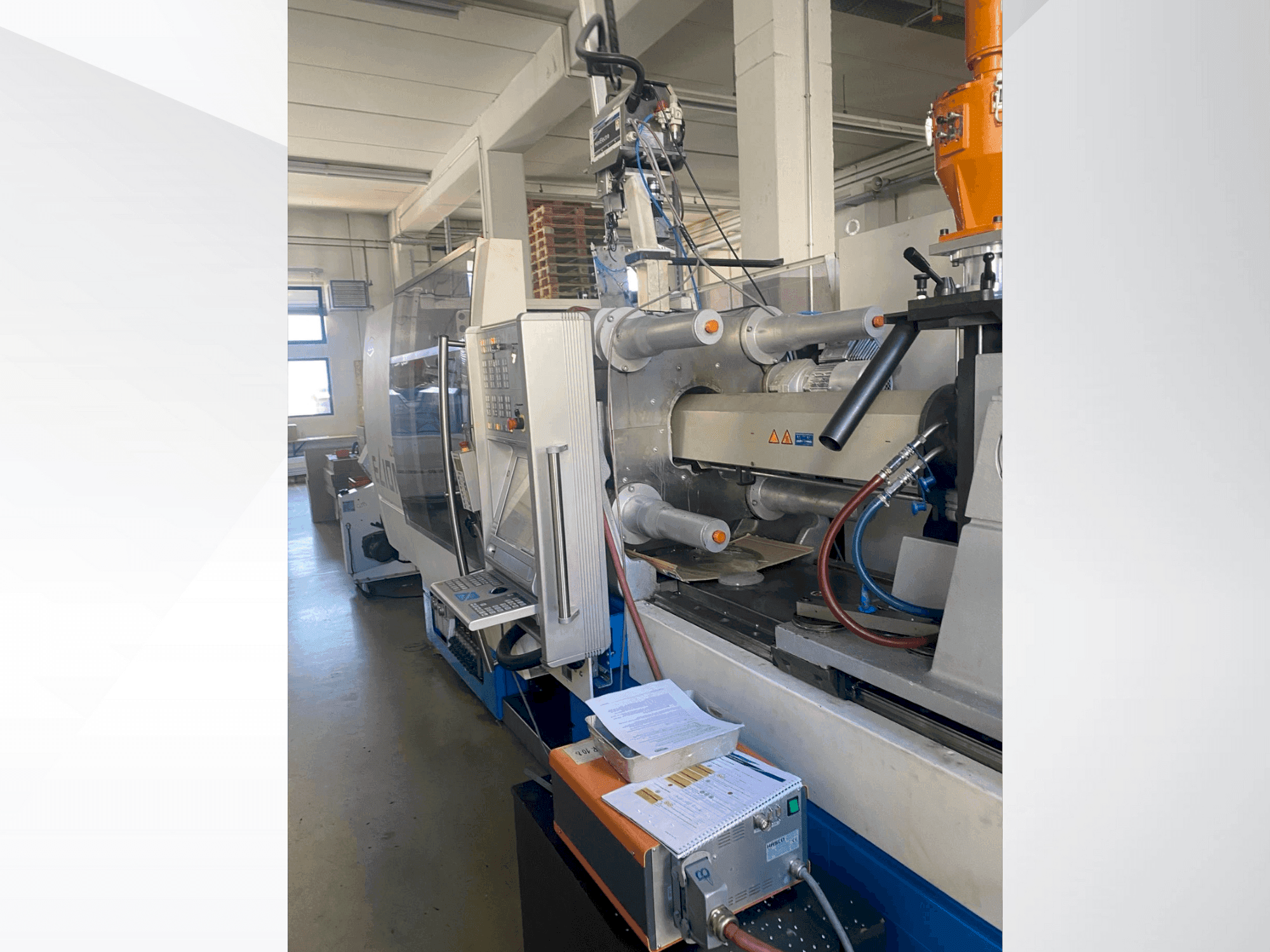 Вид станка Netstal ELION 1200-530 PM спереди