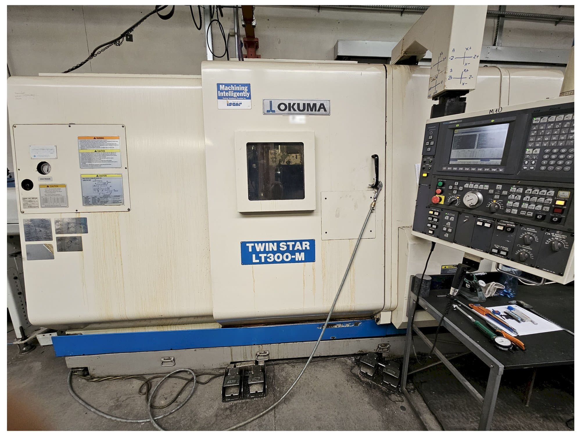 Вид станка Okuma LT300-M спереди