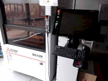 Вид станка Mitsubishi Electric SG12M спереди