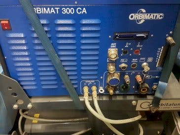 Вид станка Orbitalum ORBIMAT 300 CA AVC/OSC  спереди