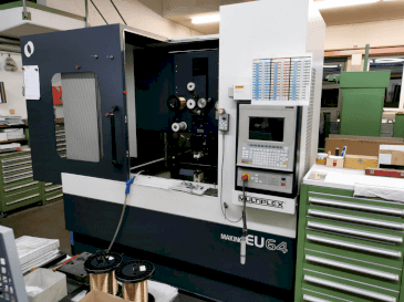 Вид станка Makino EU64 спереди