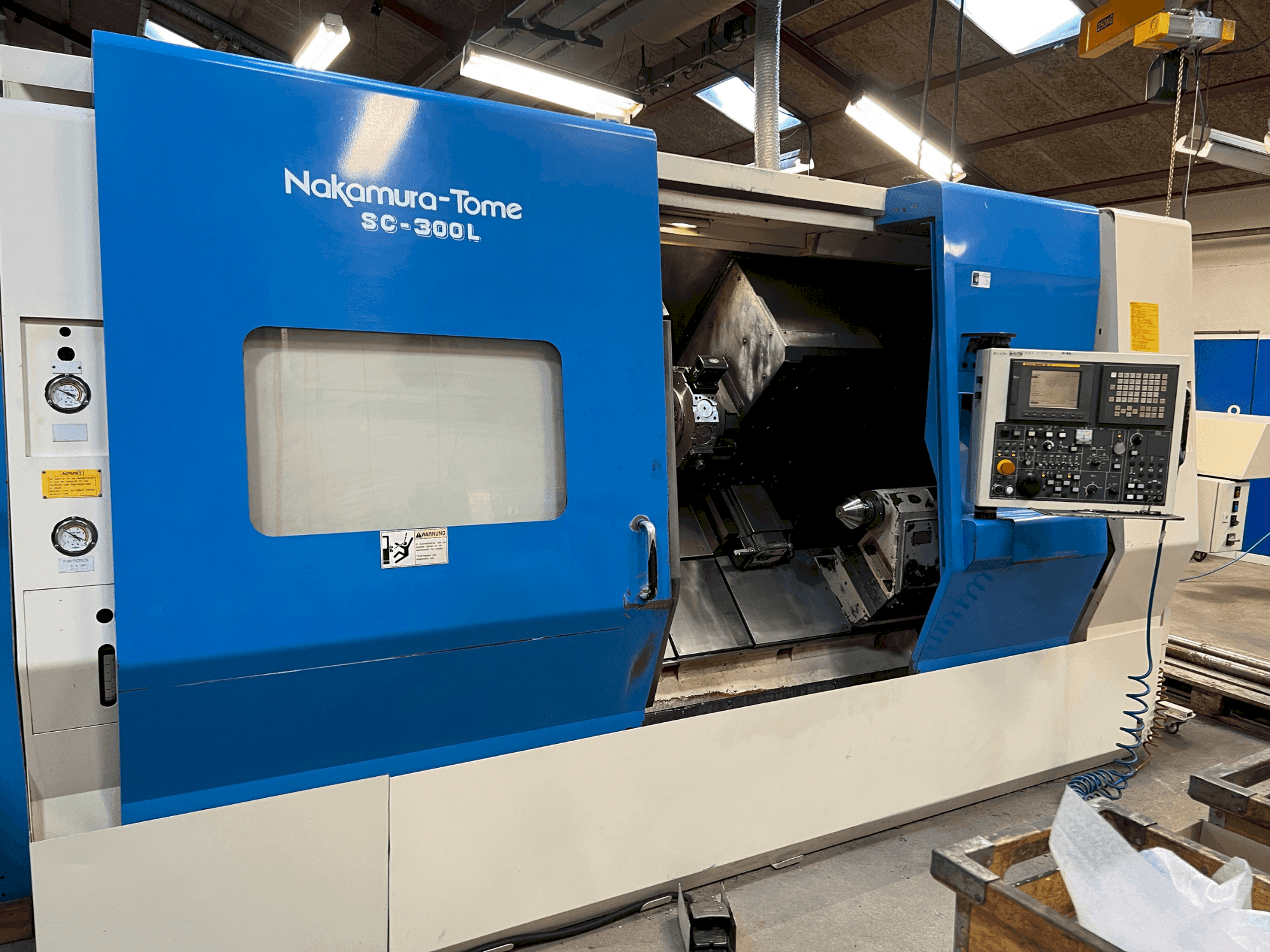 Вид станка NAKAMURA SL 300LY спереди