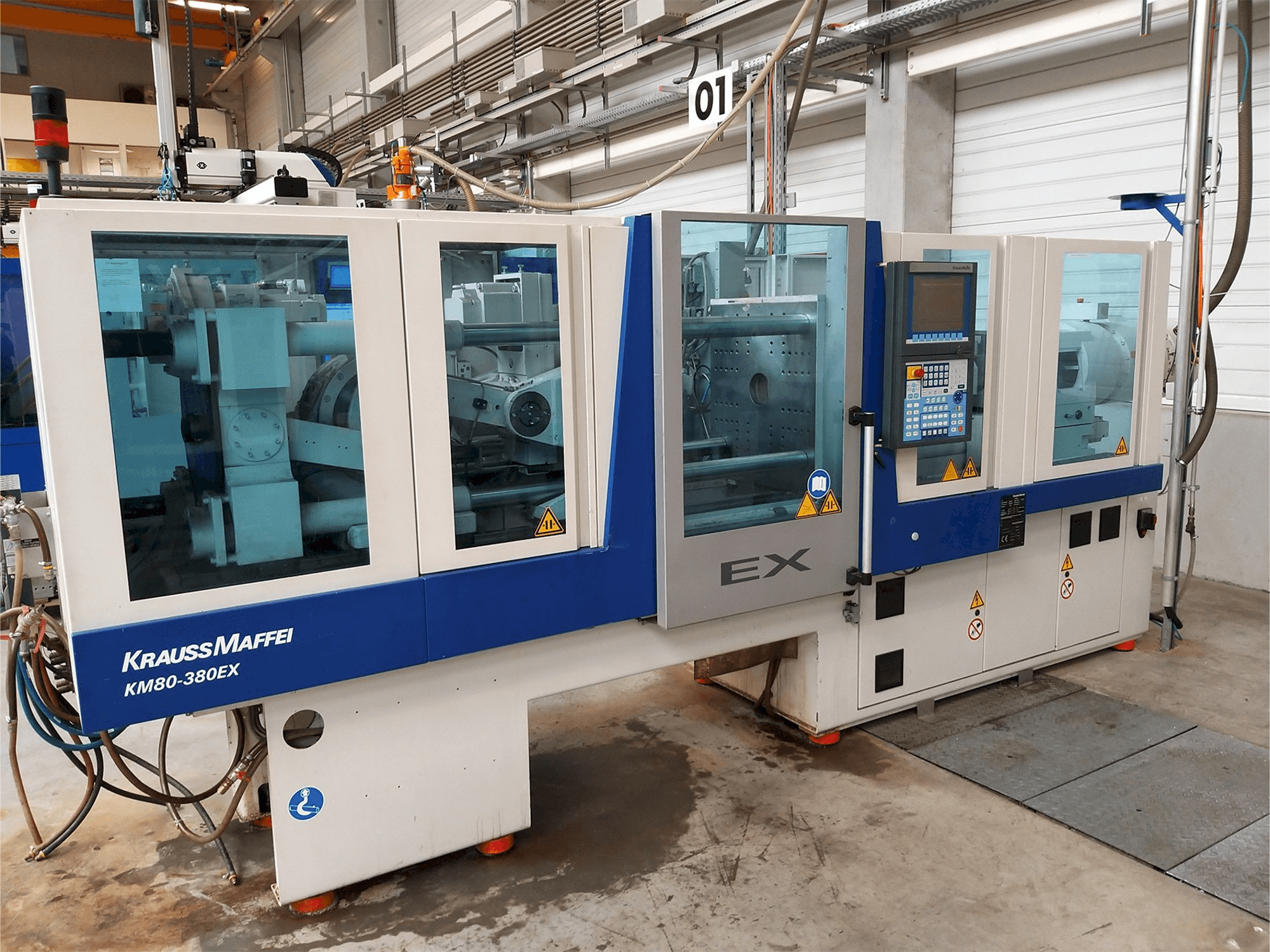 Вид станка Krauss Maffei 80-380 Ex спереди