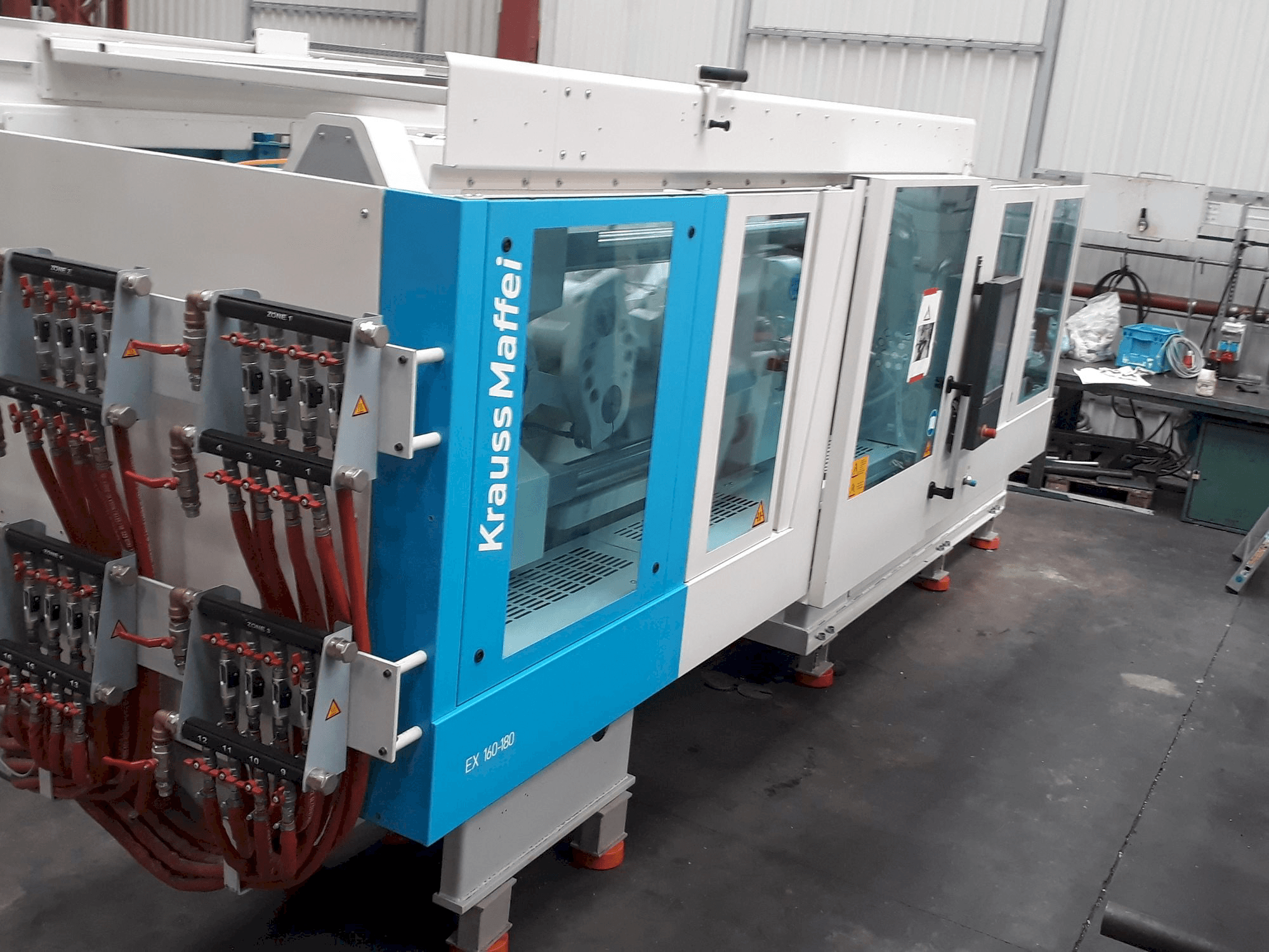Вид станка с Krauss Maffei 160-180 EX правой стороны
