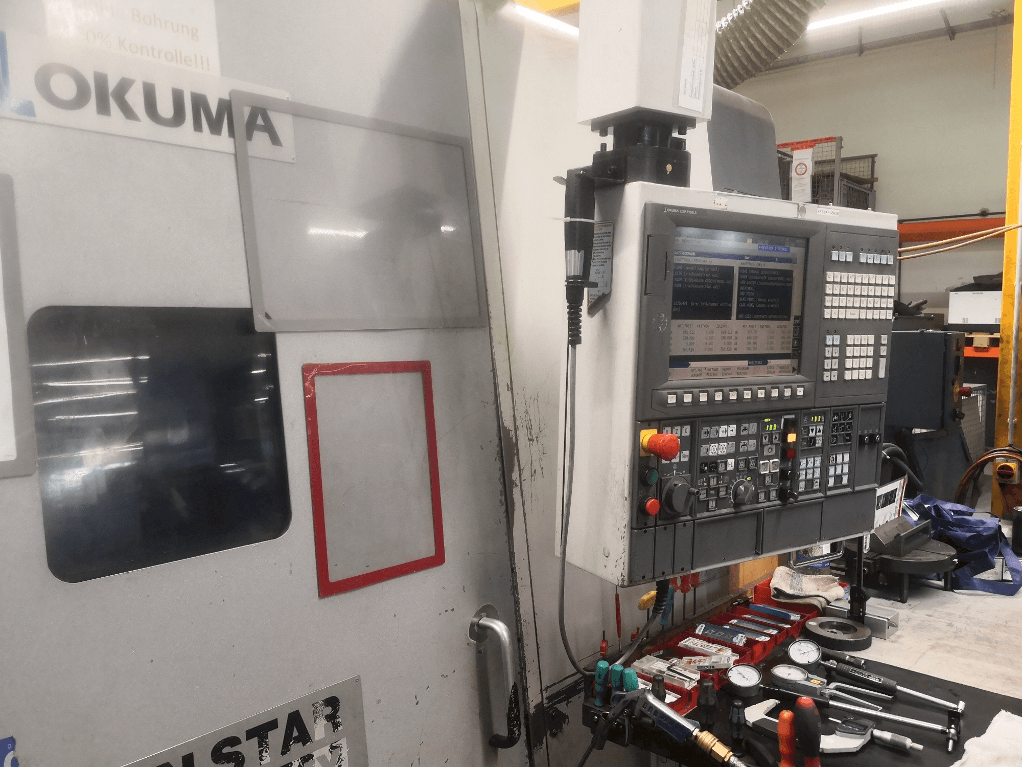 Вид станка Okuma LT 300 MY спереди