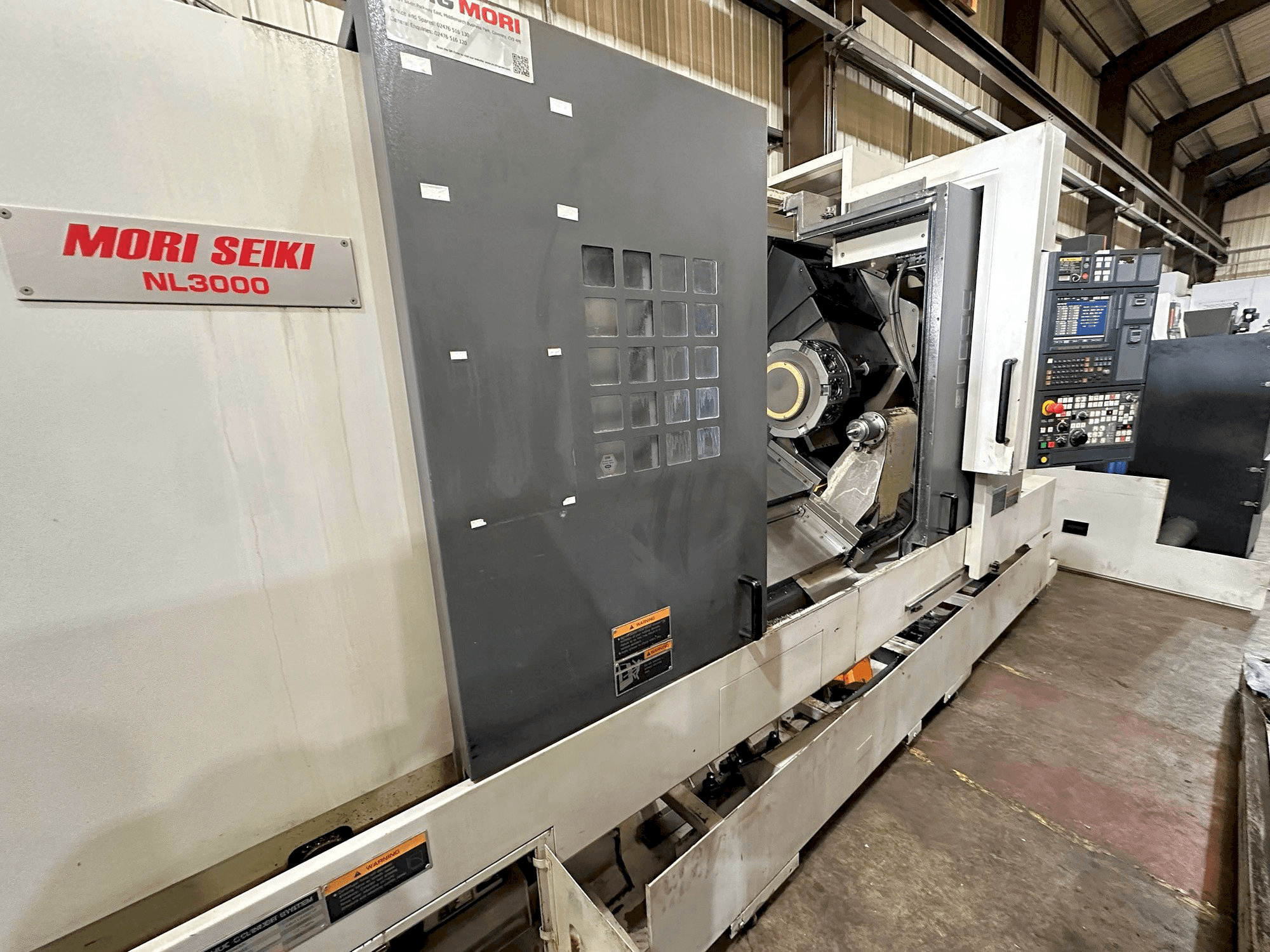 Вид станка MORI SEIKI NL3000Y/1250 спереди