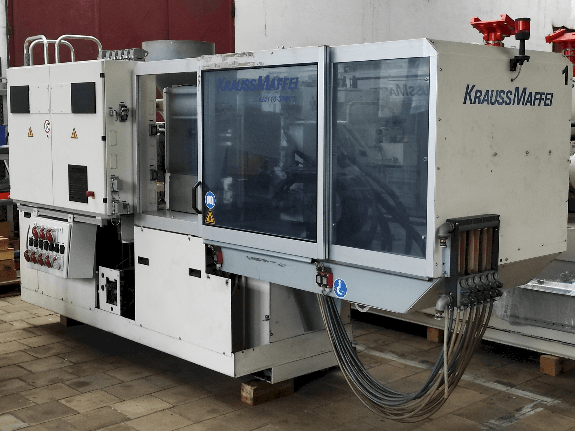 Вид станка Krauss Maffei 110 - 390 C2 спереди