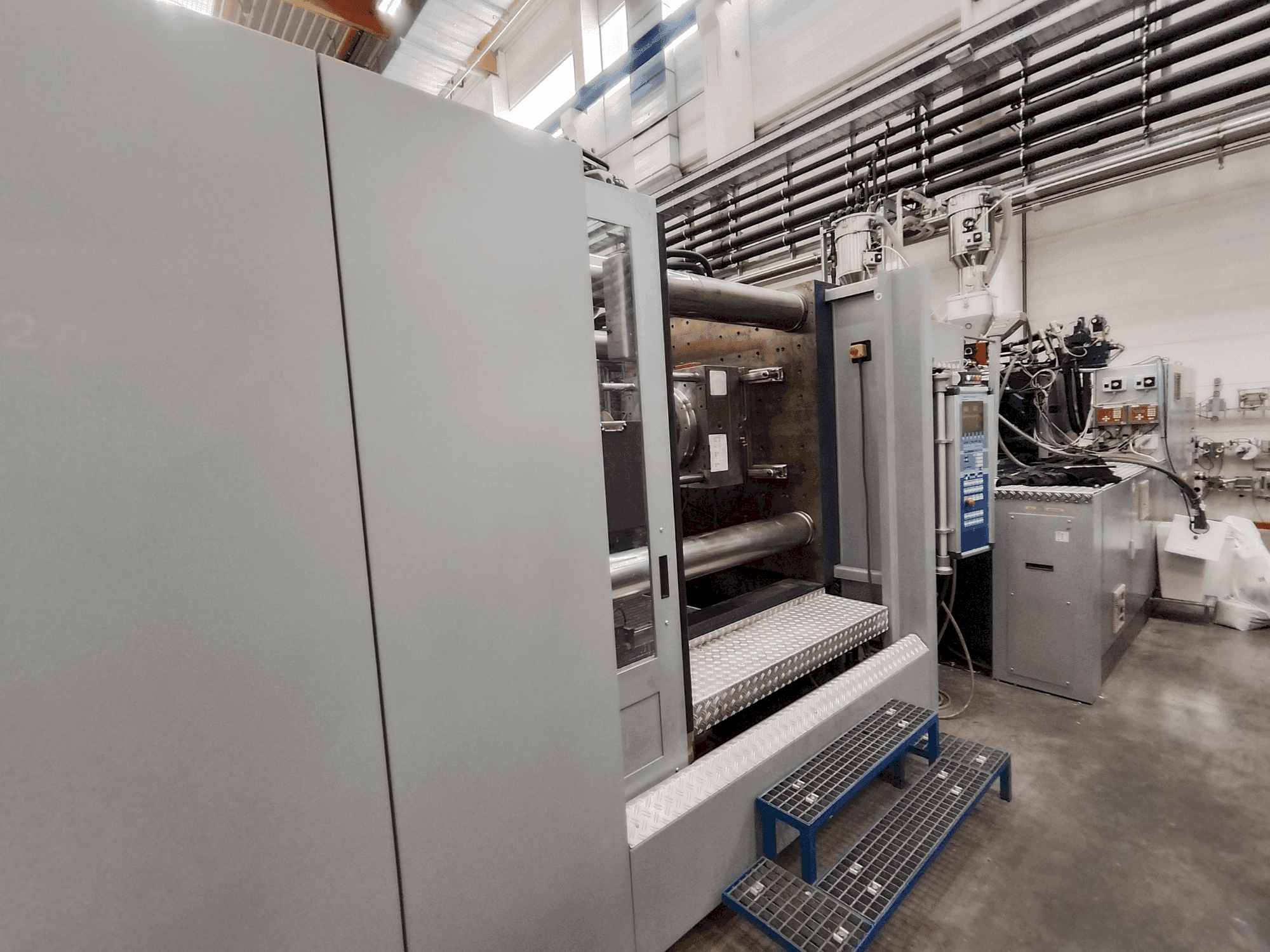 Вид станка Battenfeld HM 8000/4500 + 4500 BMB 4 спереди