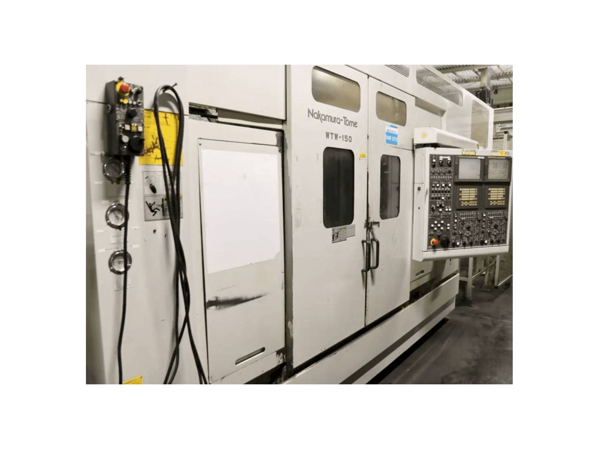 Вид станка NAKAMURA-TOME WTW-150 слева