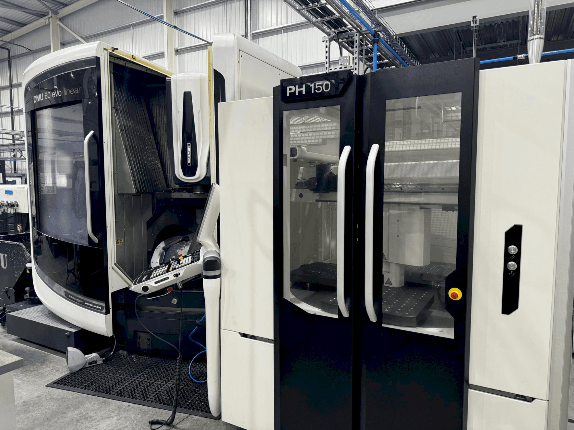 Вид станка DMG MORI DMU 60 eVo + PH150 спереди