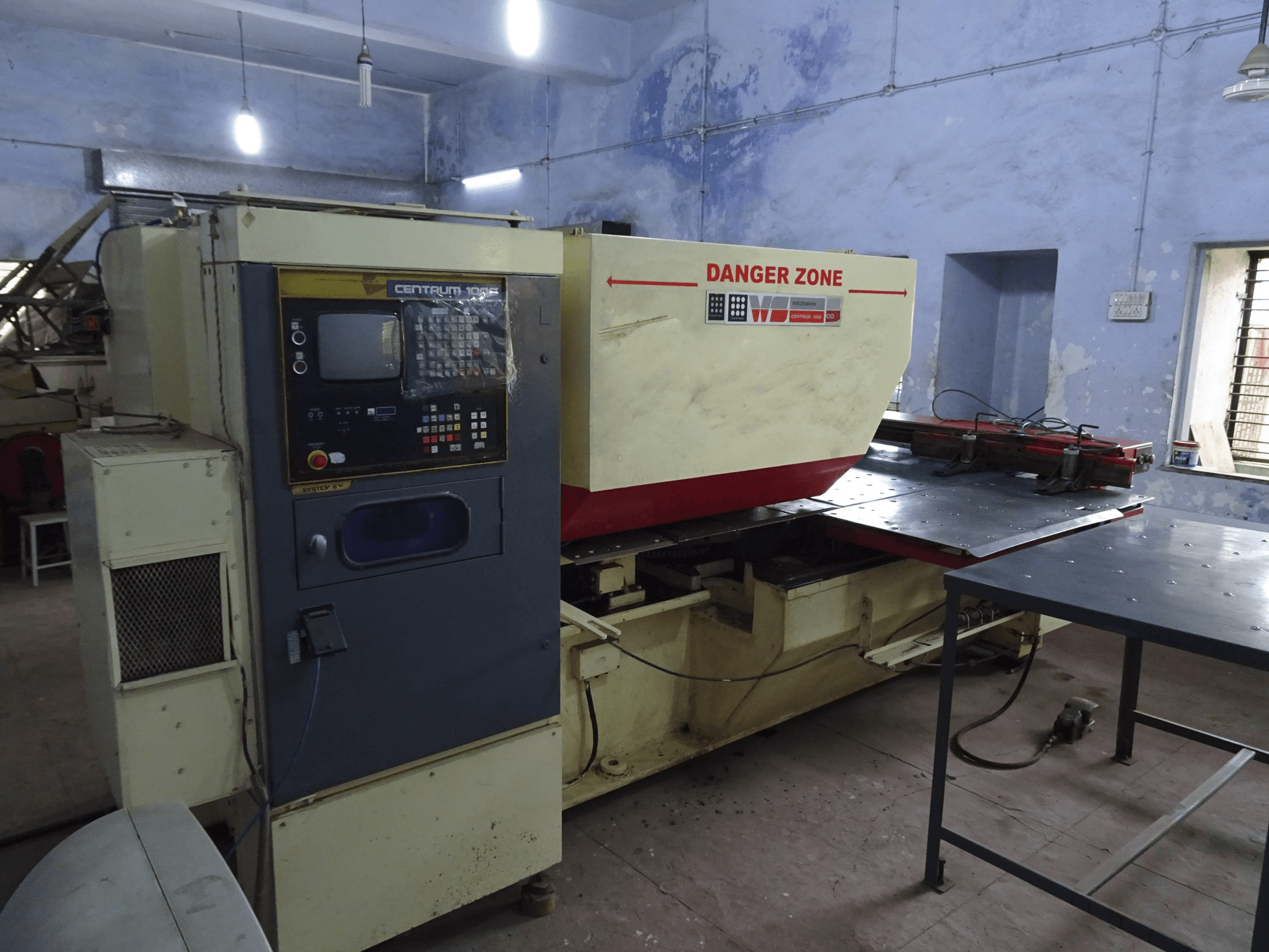 Left view of Murata Wiedemann C-1000 Machine