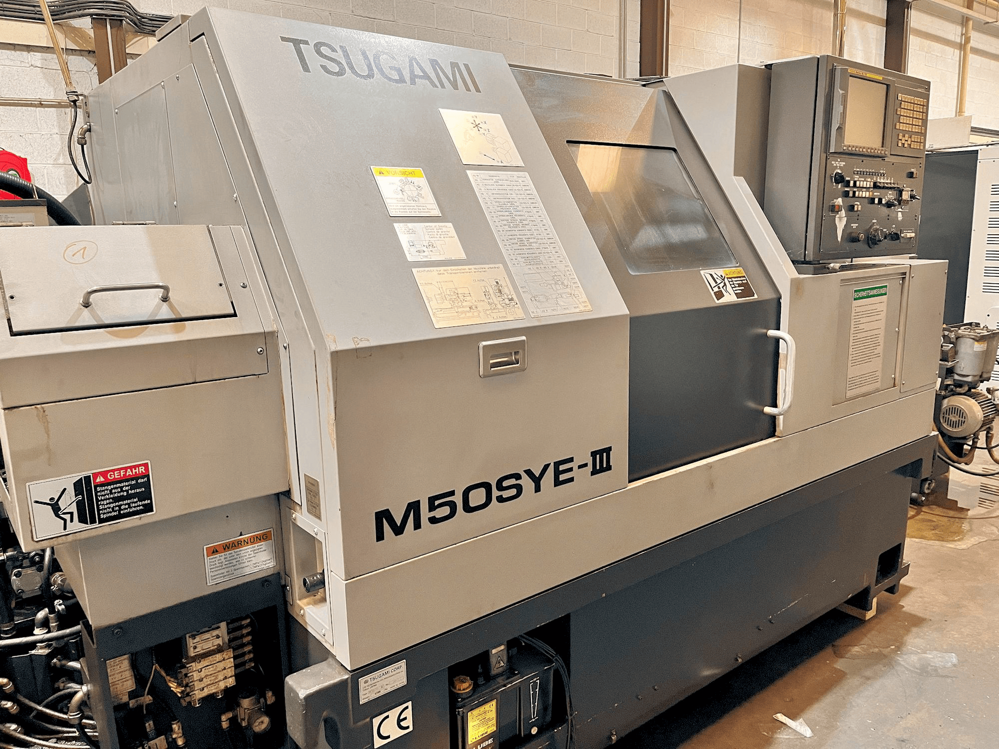 Вид станка TSUGAMI M50SYE-III спереди