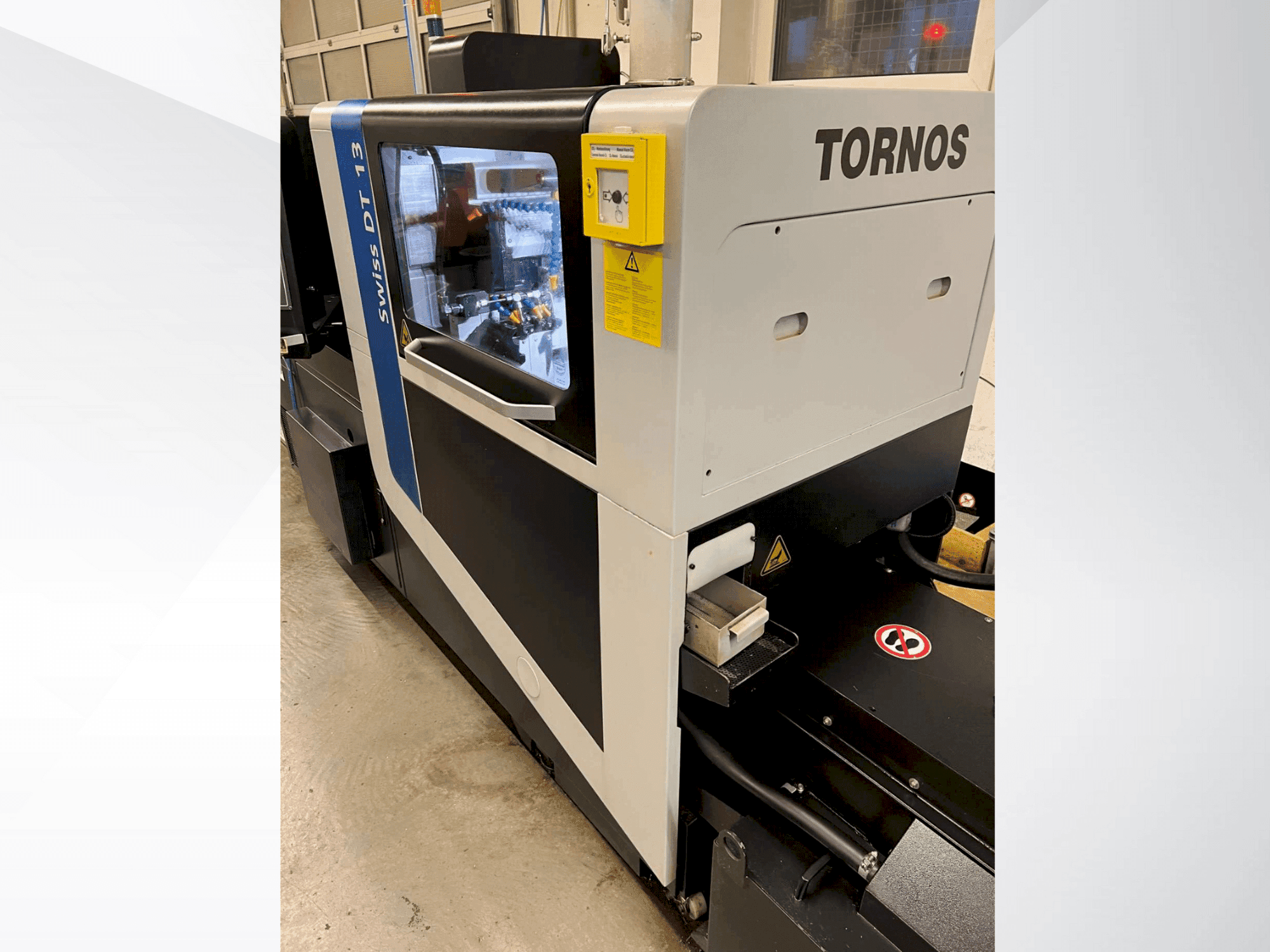 Вид станка Tornos Swiss DT 13 спереди