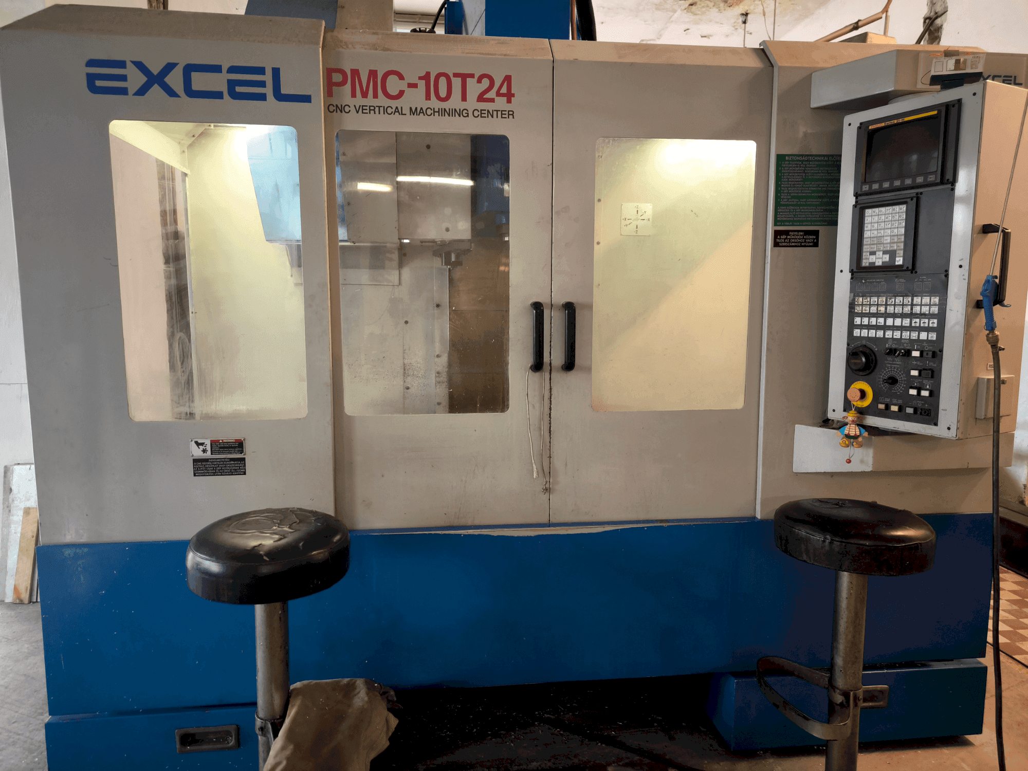 Вид станка Excel Excel PMC 10T24 (2004) спереди