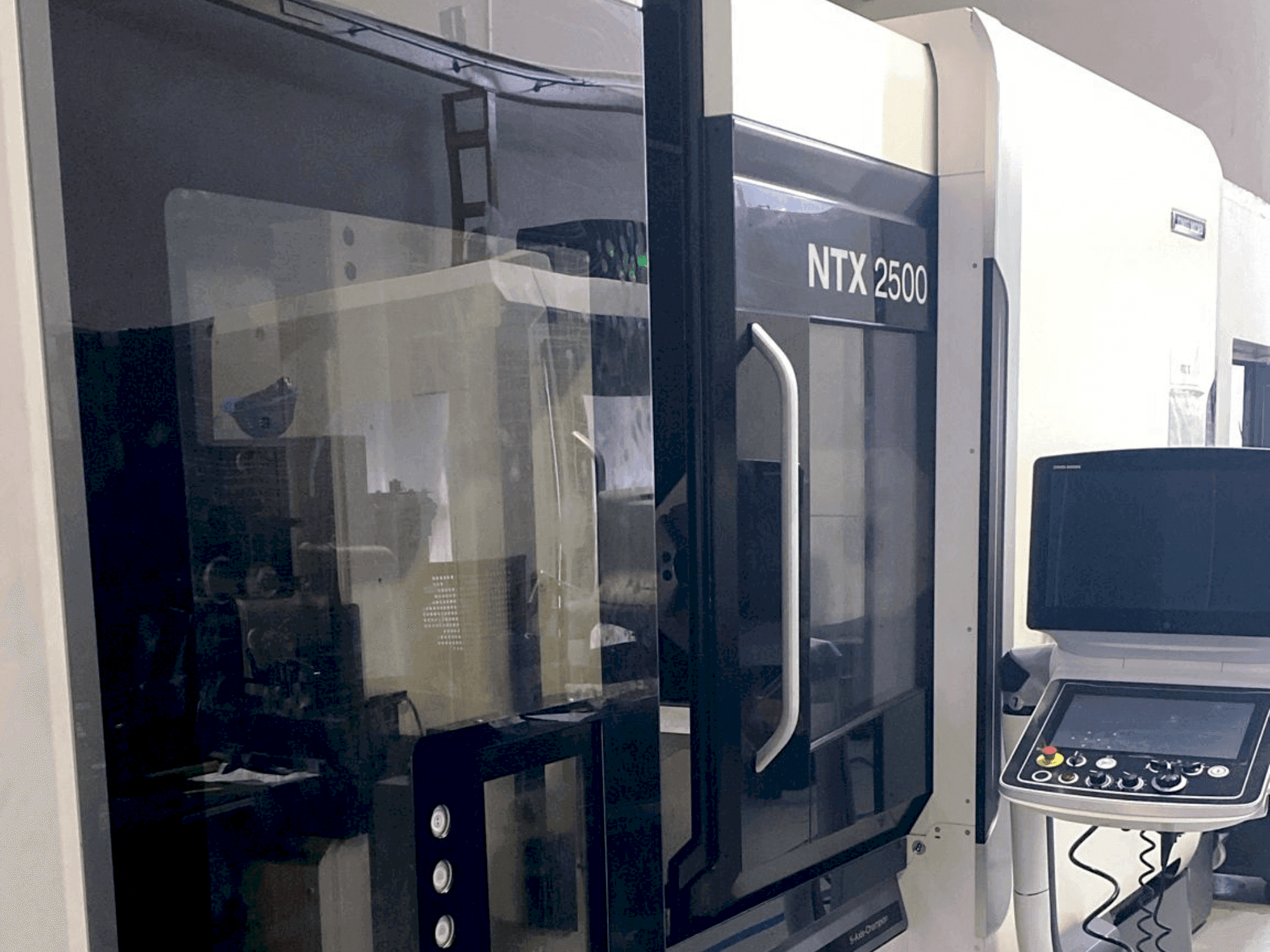 Вид станка DMG MORI NTX2500 / 1500 спереди