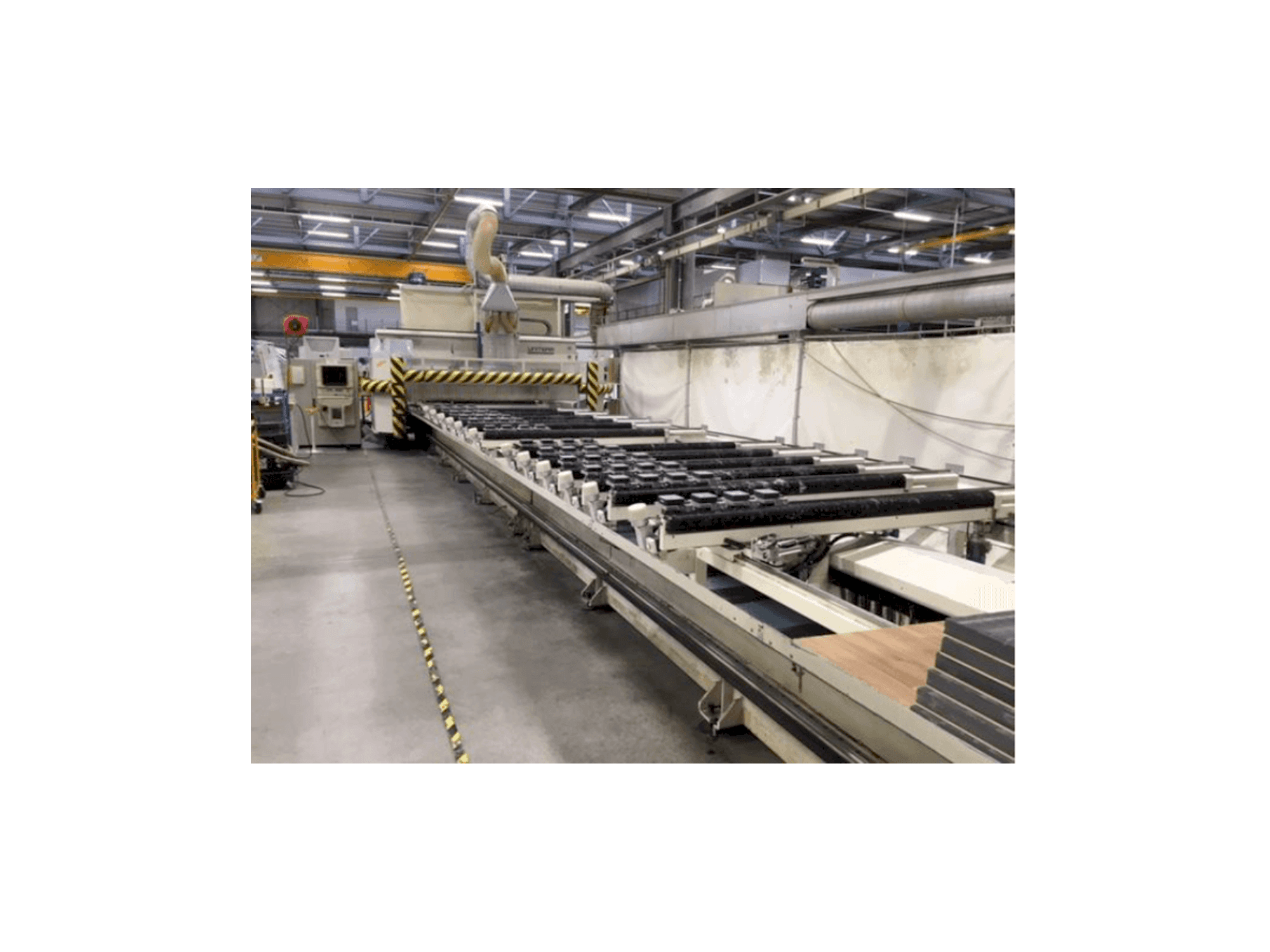 Left side view of Uniteam 5 achs machine