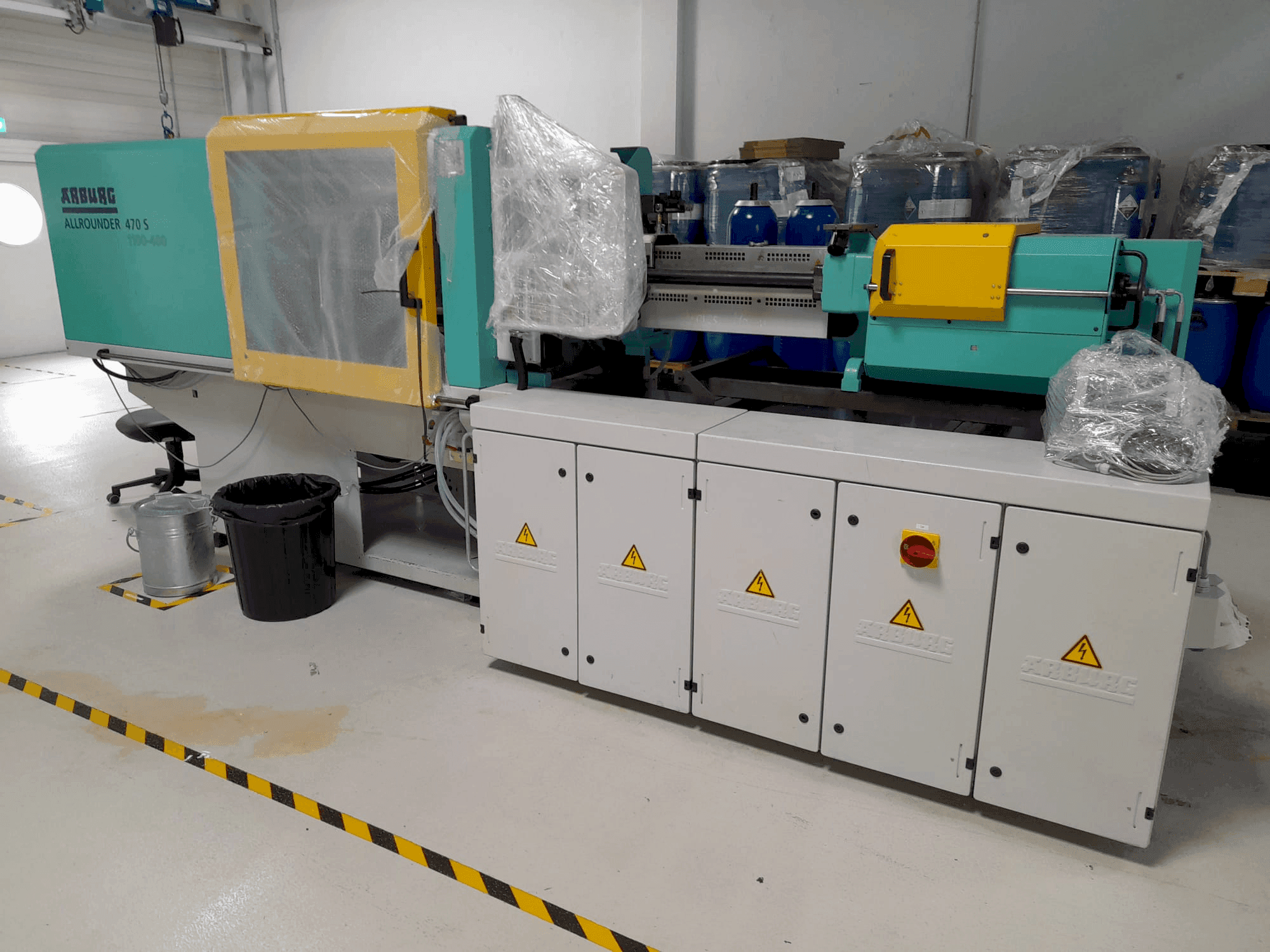 Вид станка Arburg Allrounder 470S 1100-400 with Multilift handling (2010) спереди