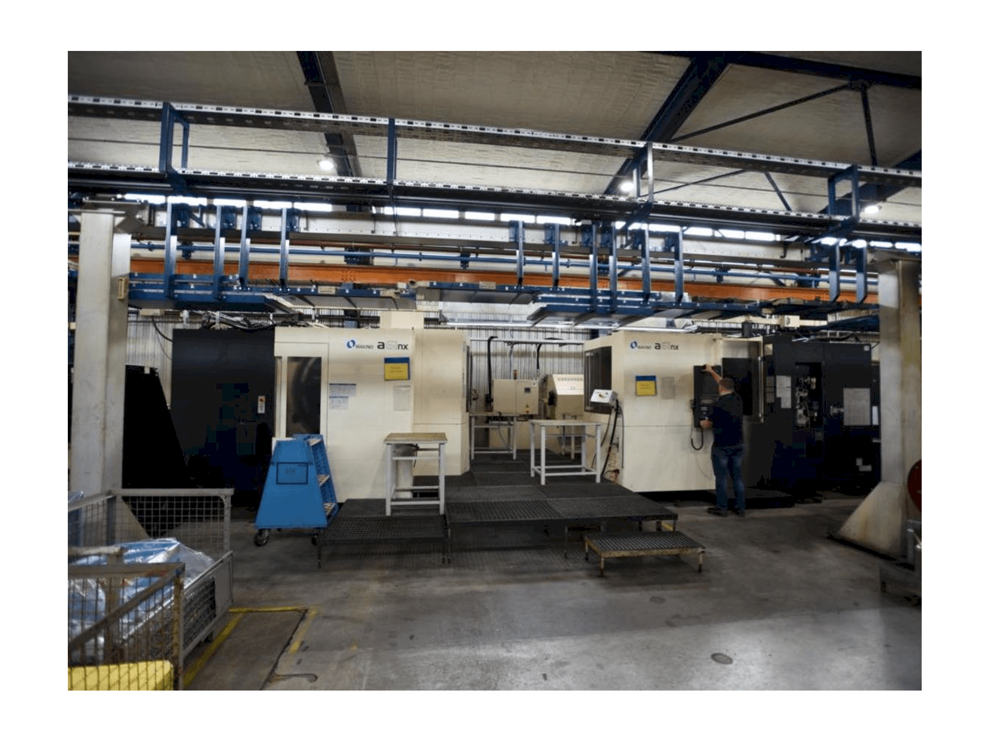 Вид станка Makino a61nx Pro 6 спереди