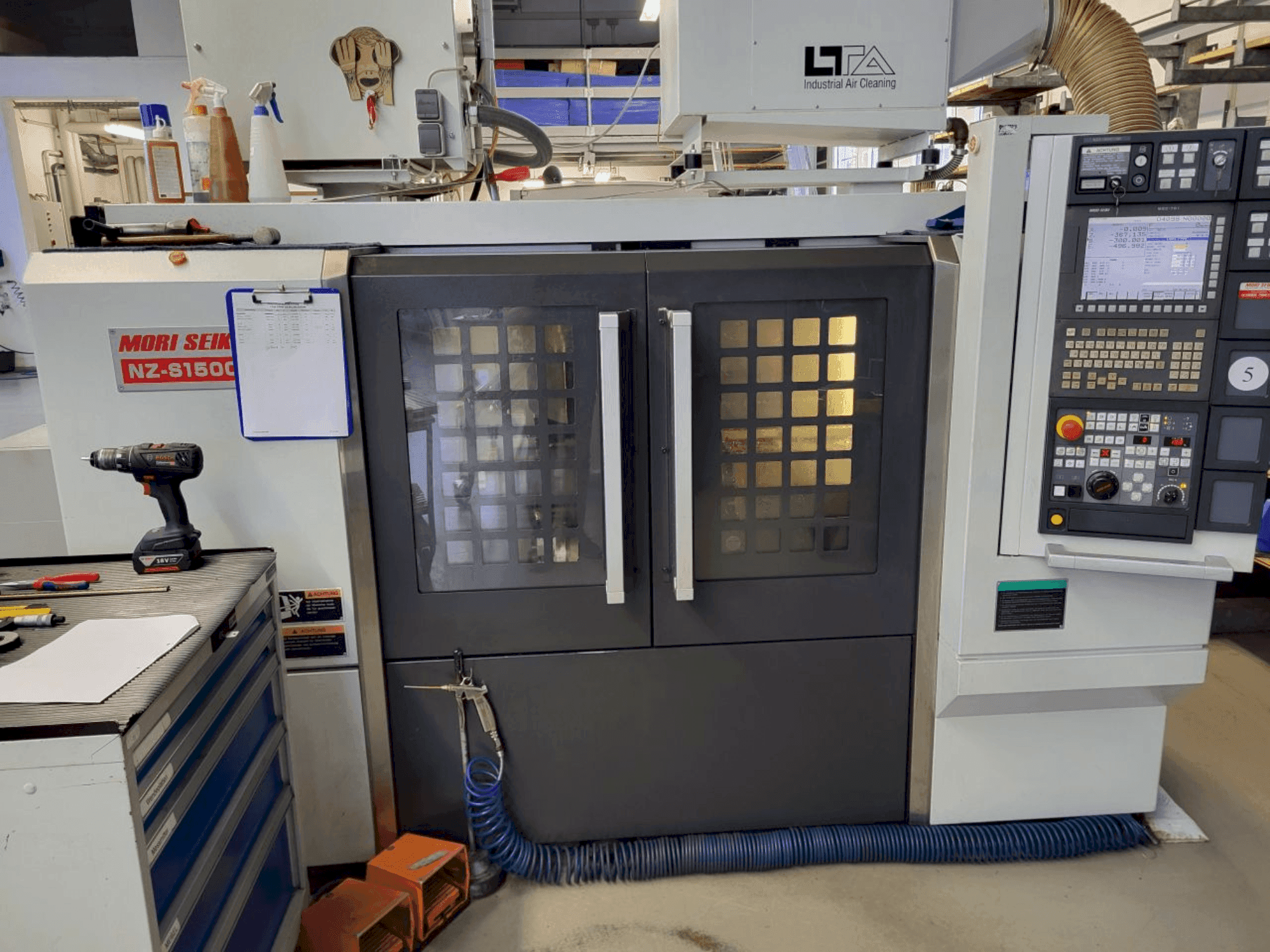Вид станка MORI SEIKI NZ-S1500 спереди
