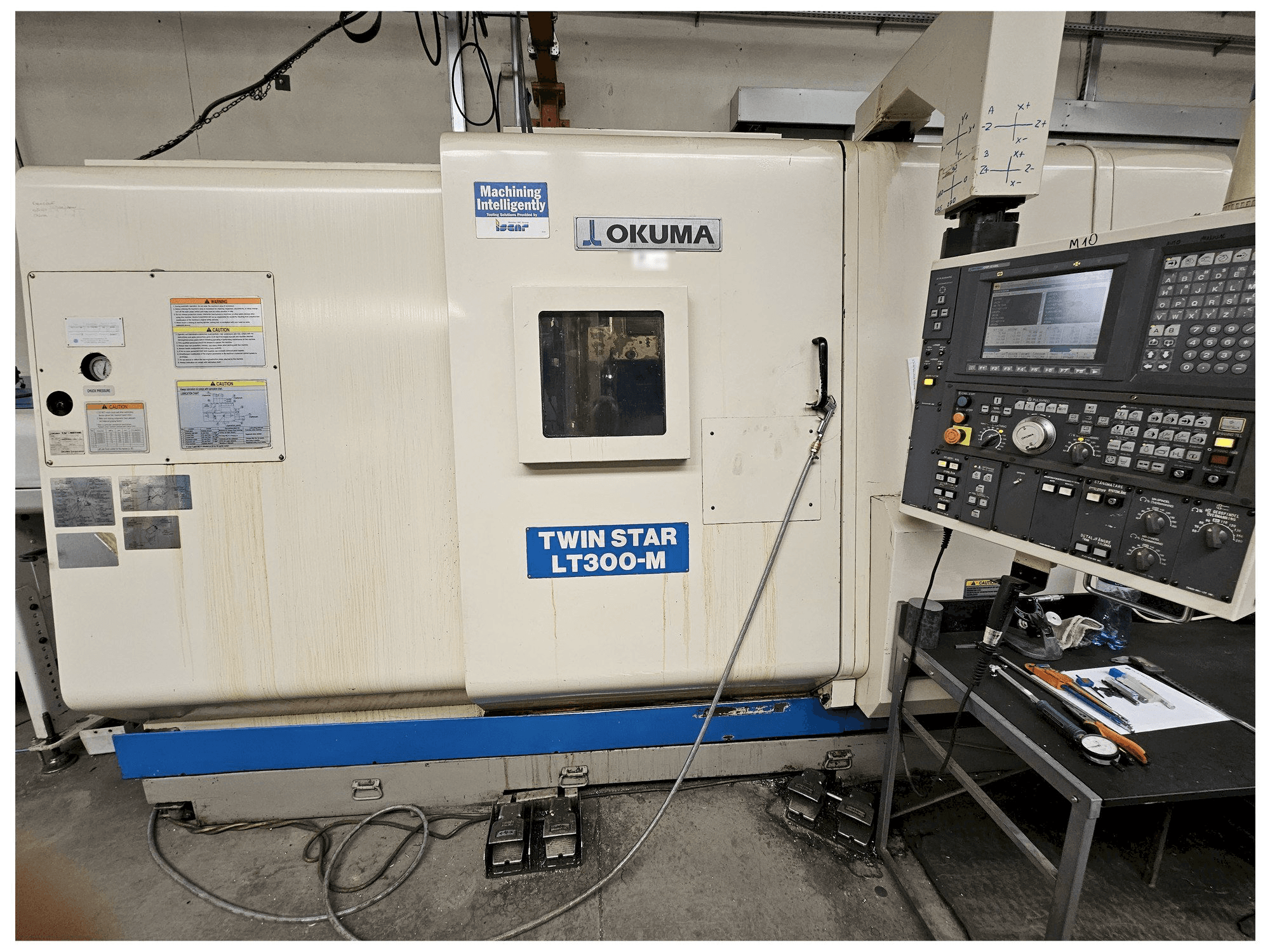 Вид станка Okuma LT300-M спереди