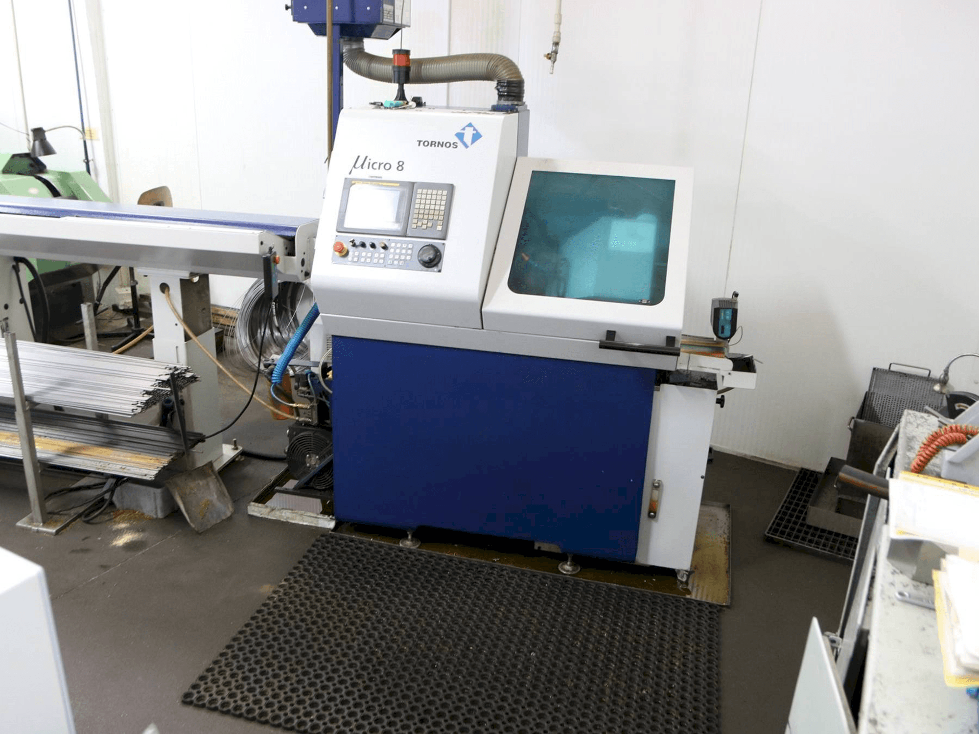 Front view of Tornos Micro 8 machine