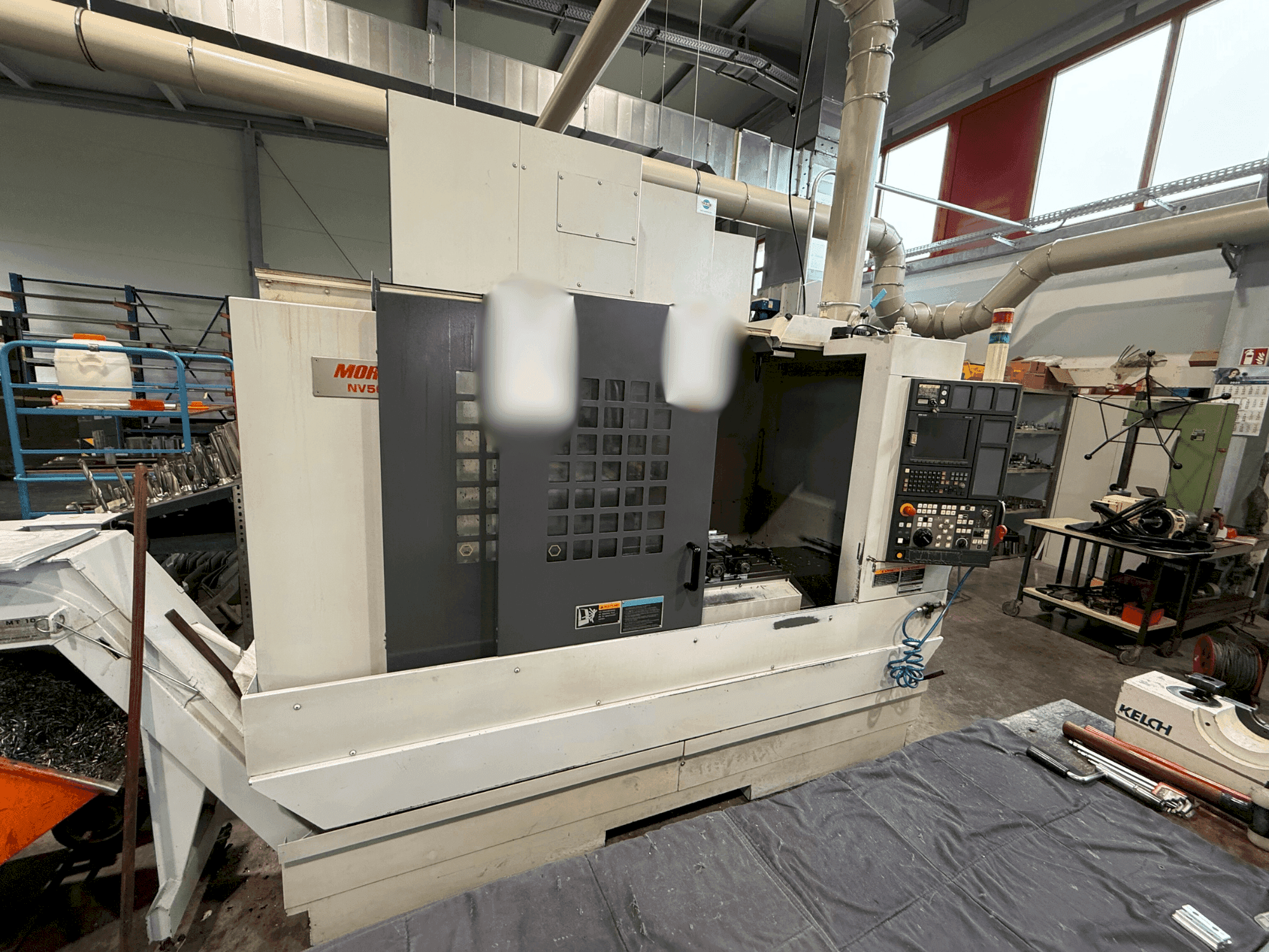 Вид станка MORI SEIKI NV 5000 a1 B/40 спереди