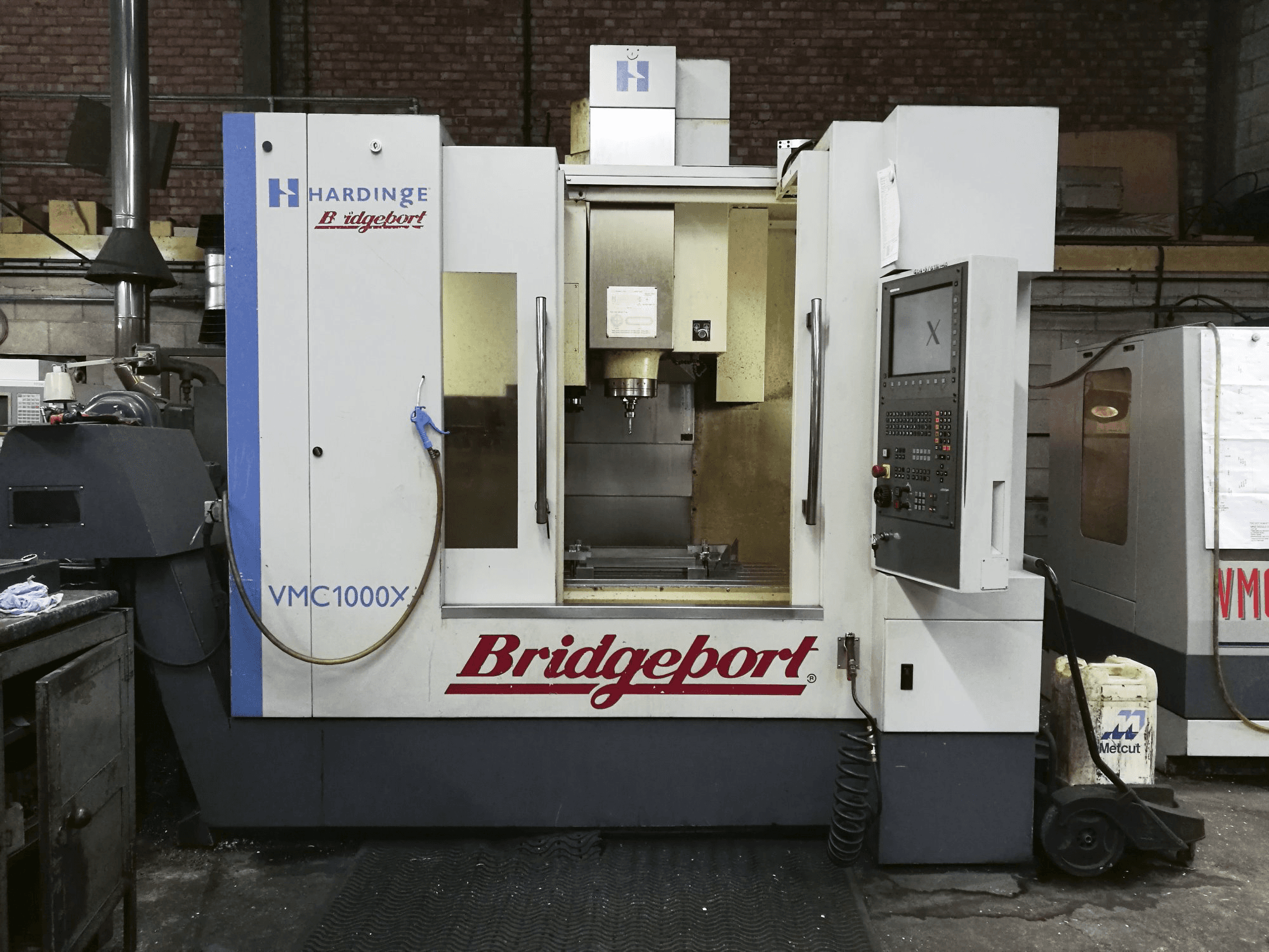 Front view of Bridgeport VMC XP3-1000 Machine