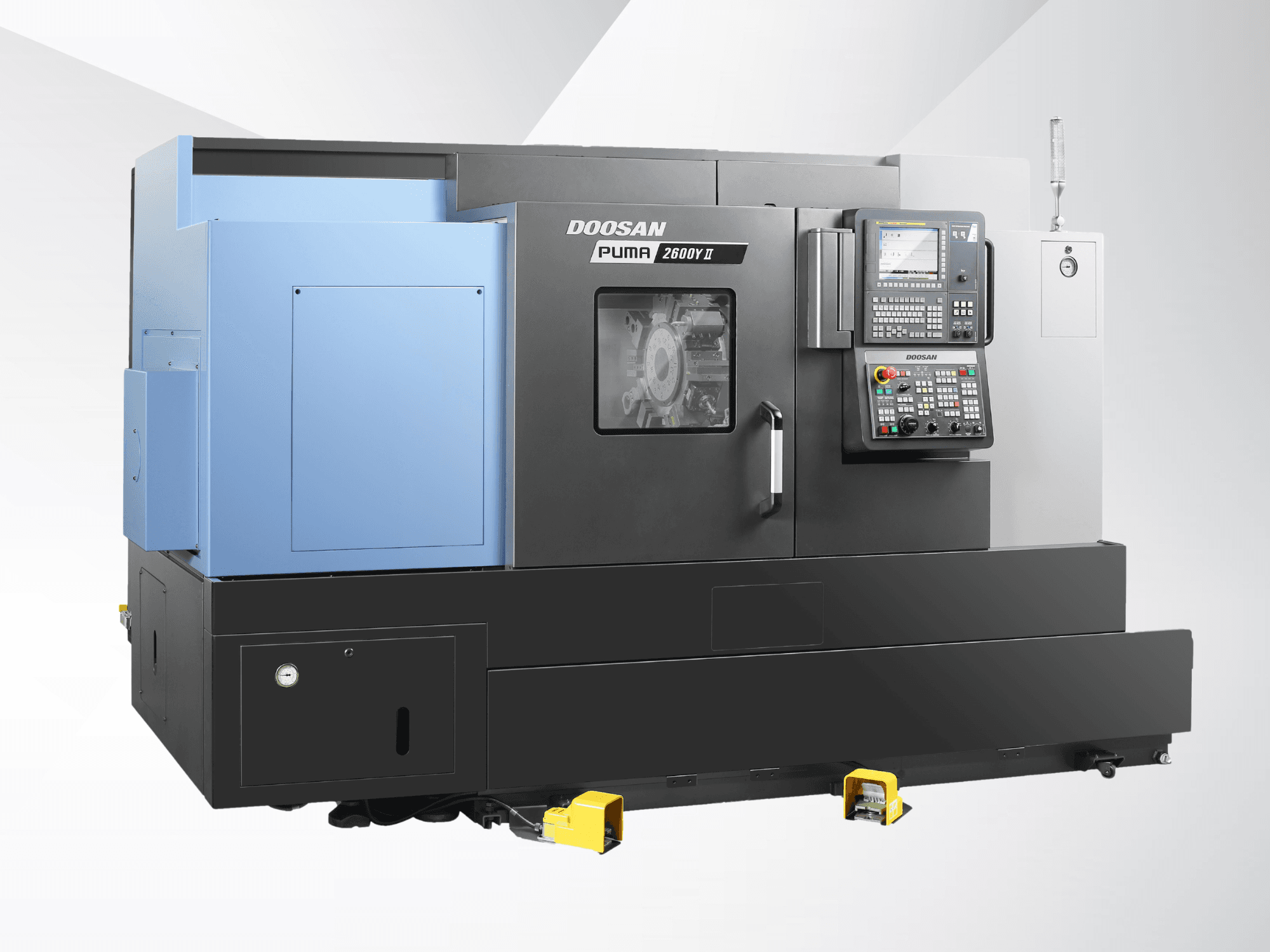 Вид спереди токарно-фрезерного центра DN SOLUTIONS PUMA 2600Y II с изображением панели управления и деталей корпуса станка.