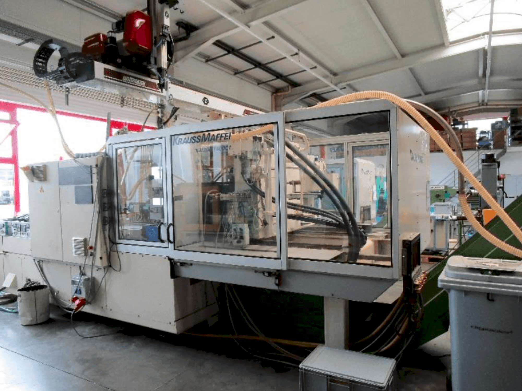 Вид станка Krauss Maffei 300-1400 C1 спереди