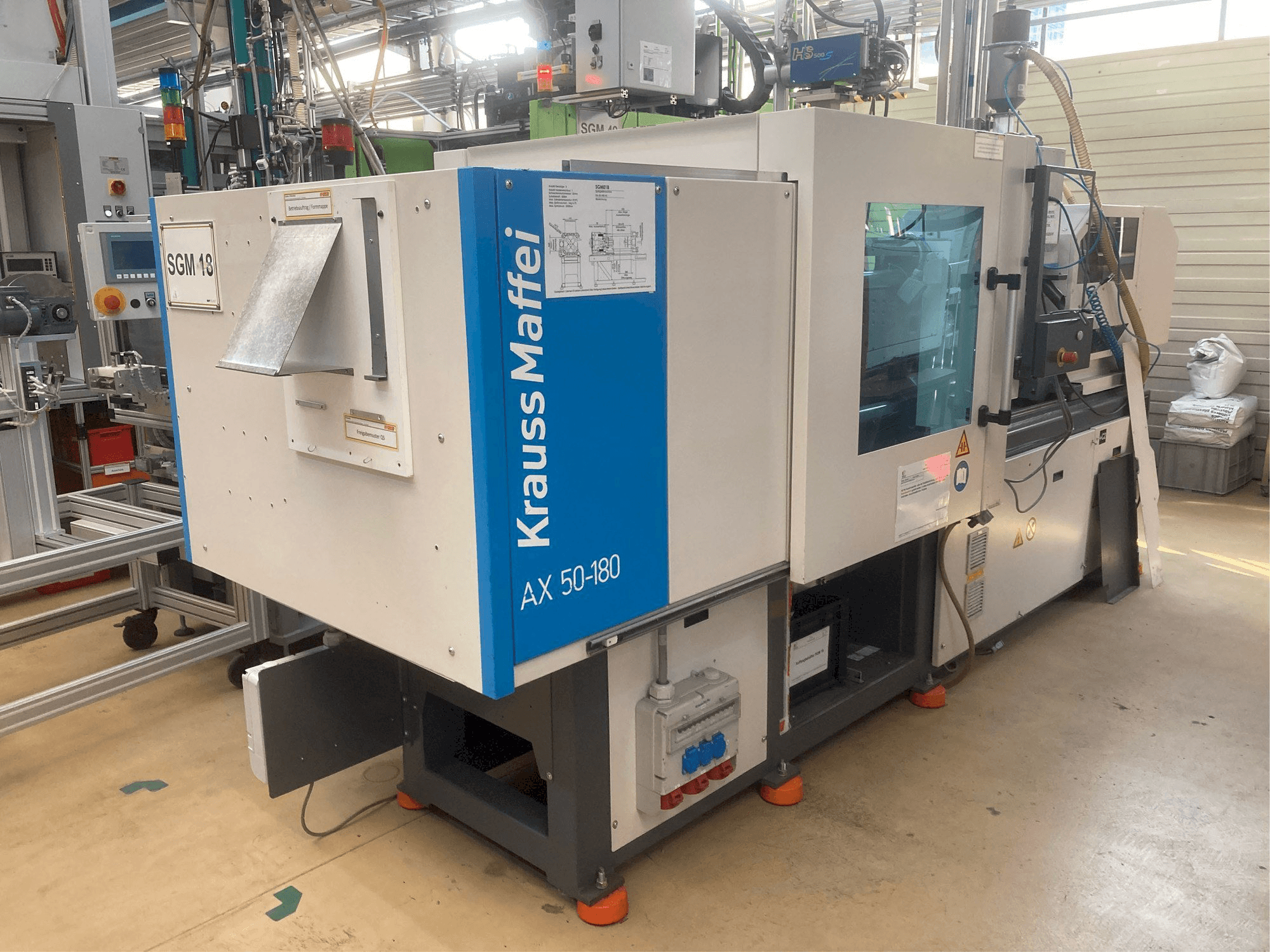 Вид станка с Krauss Maffei AX 50-180 правой стороны