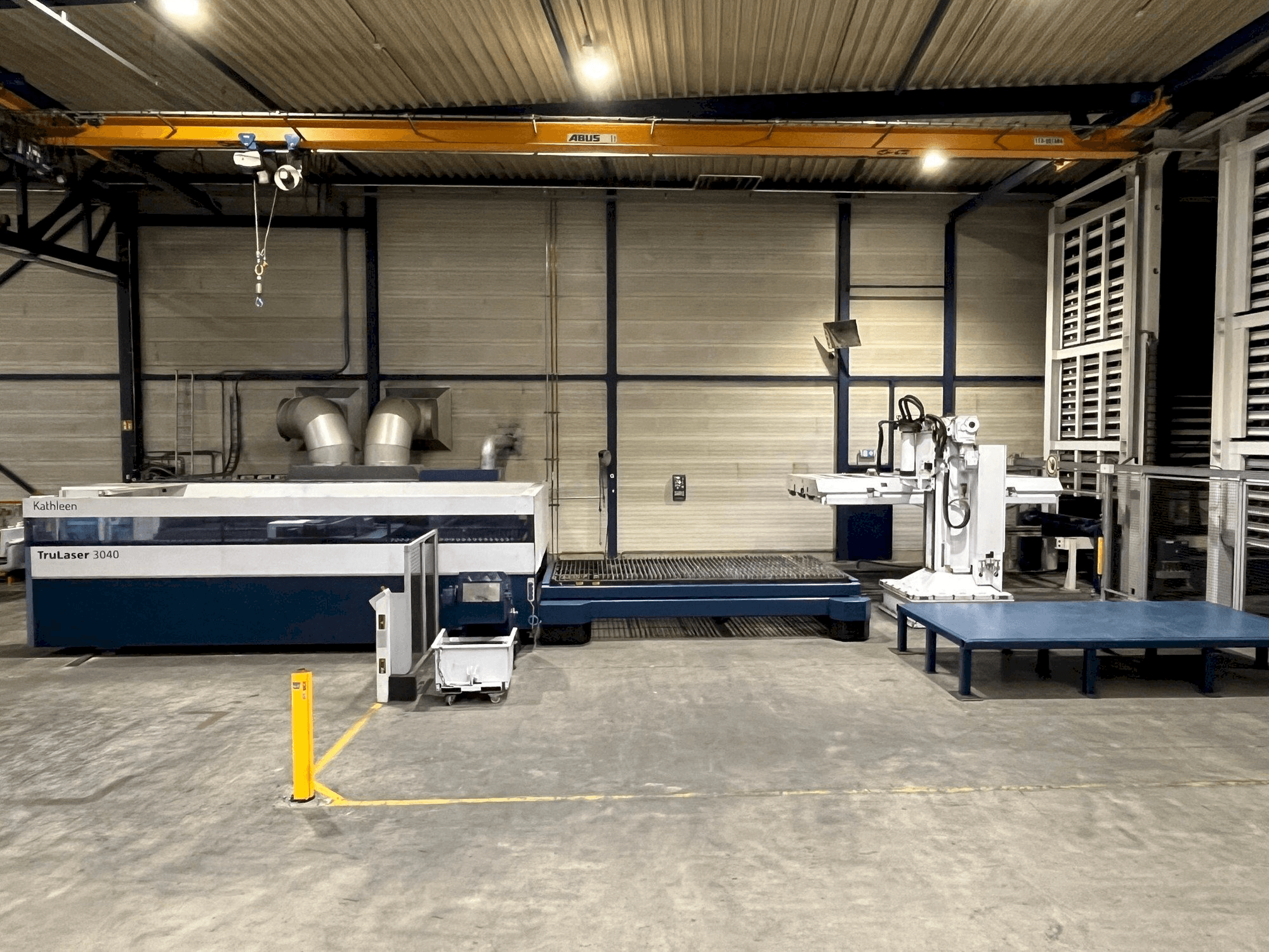 Вид станка Trumpf TruLaser 3040 6kW CO2 + Liftmaster спереди