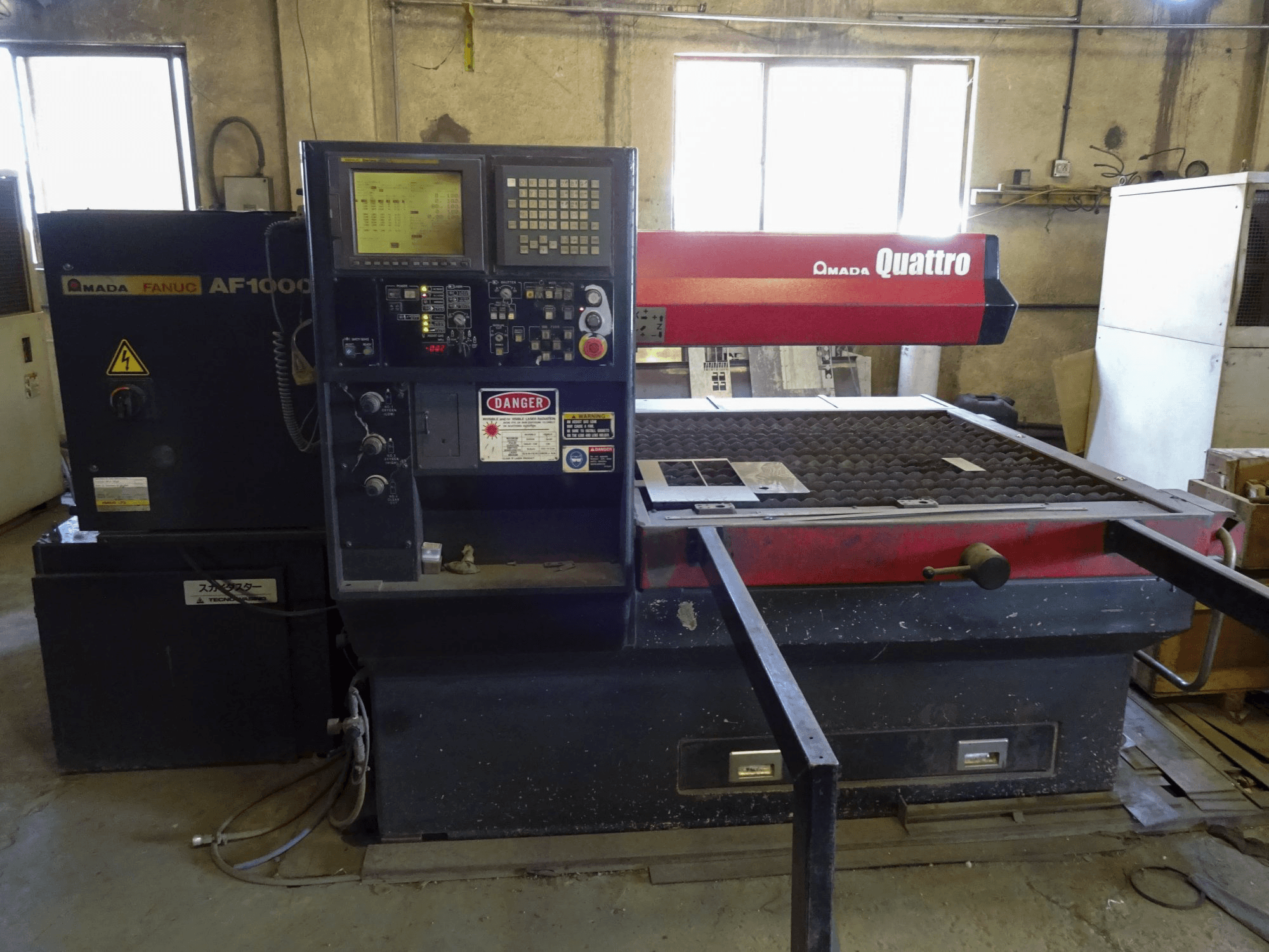 Front view 1 of AMADA Quattro AF1000E machine