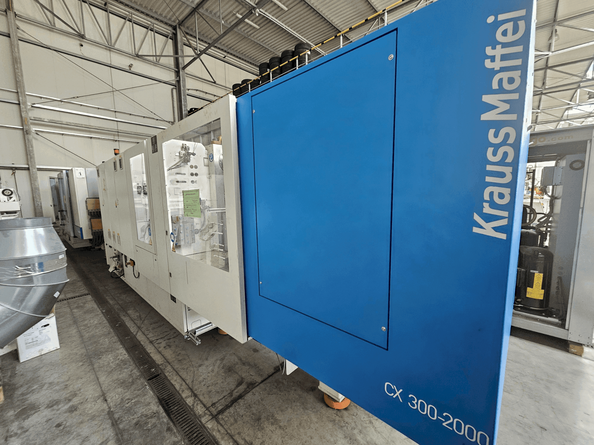 Вид станка Krauss Maffei 300-2000 CX спереди