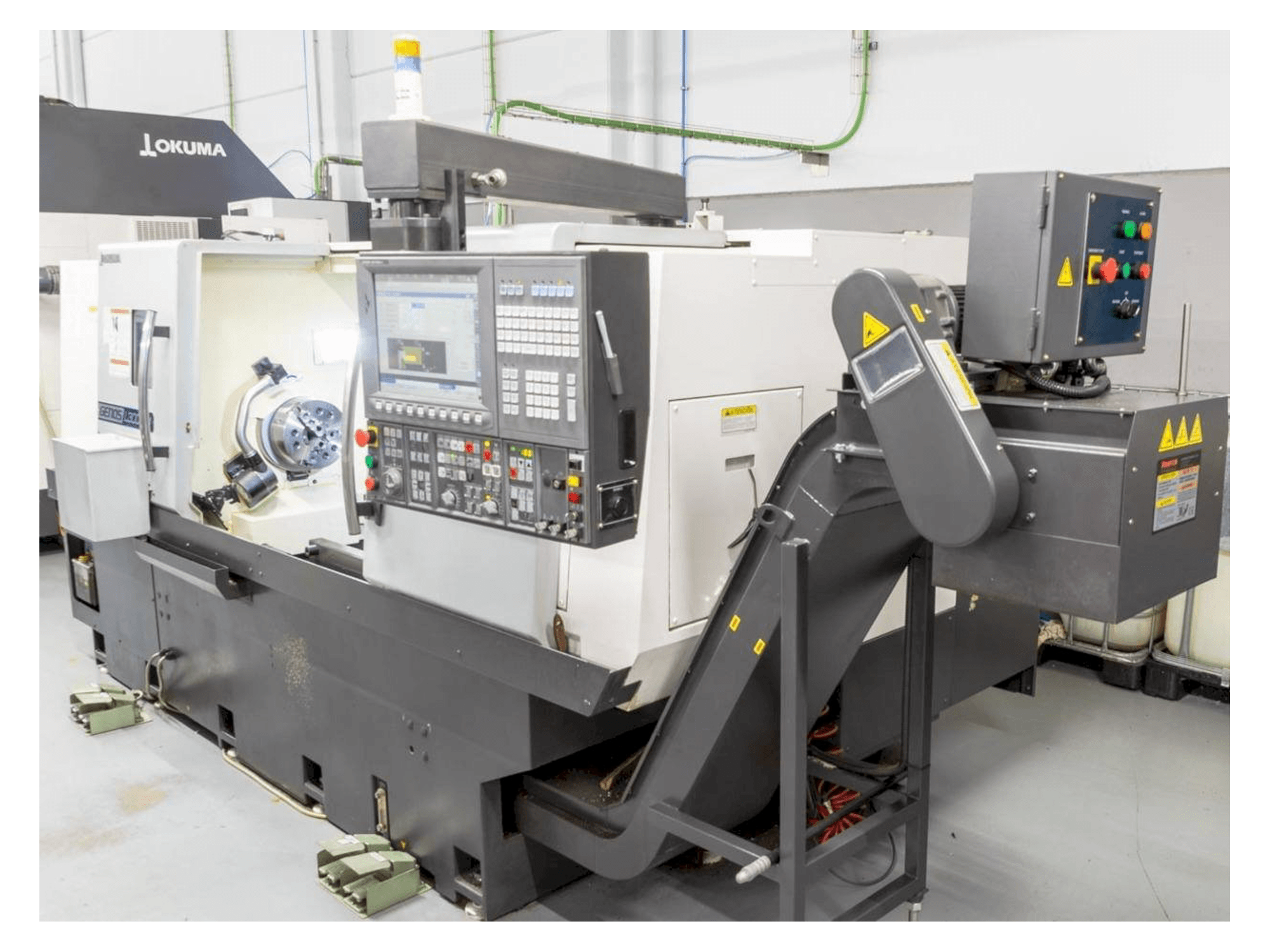 Вид станка Okuma Genos L300E-M спереди