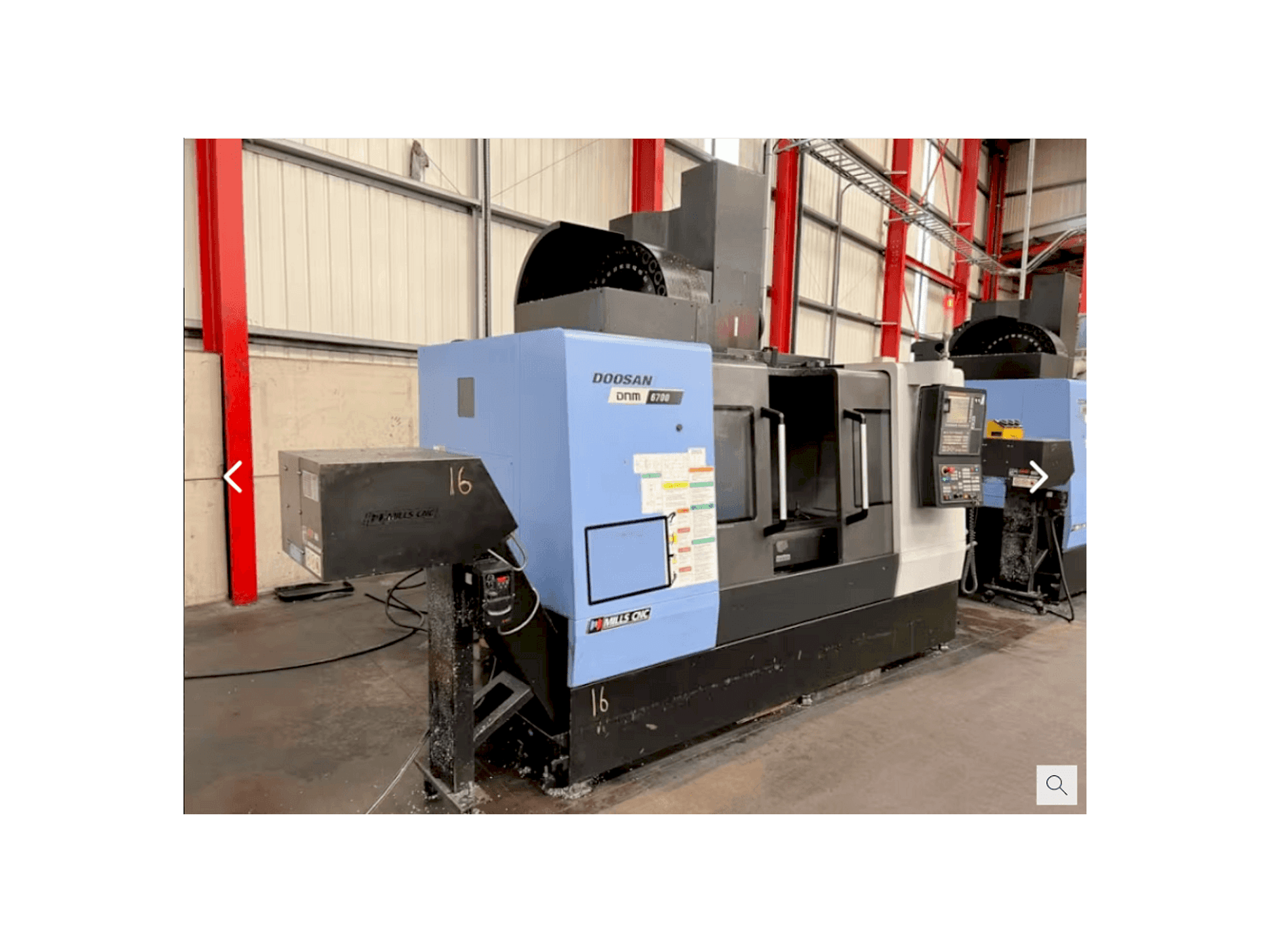 Вид станка Doosan DNM 6700 спереди