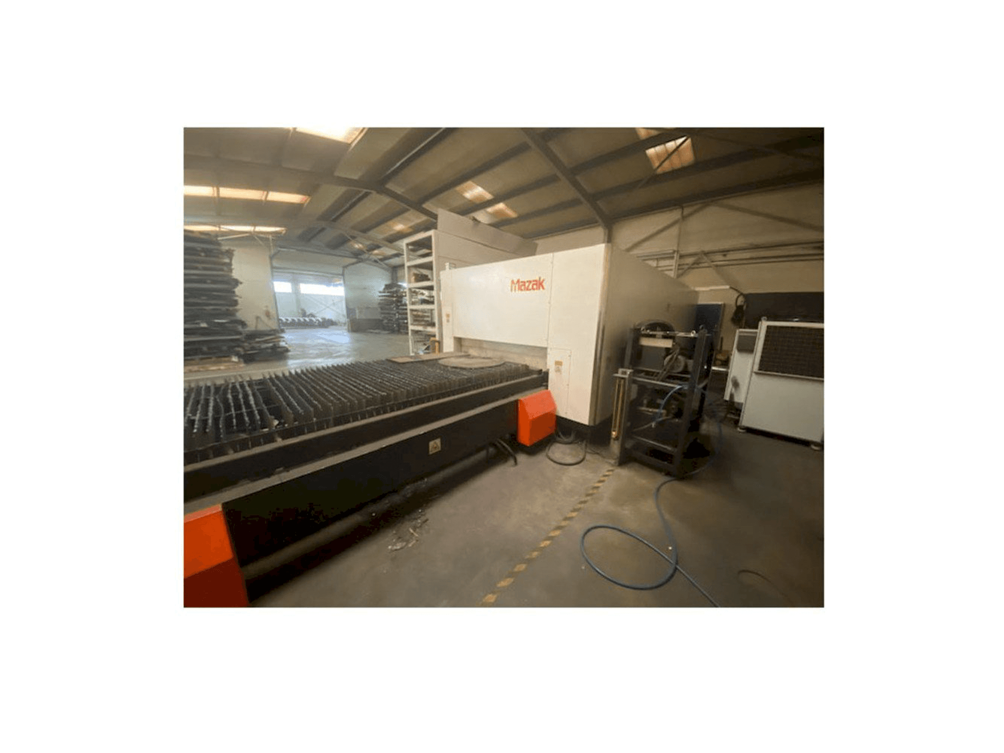 Вид станка Mazak Optiplex Nexus 3015 спереди