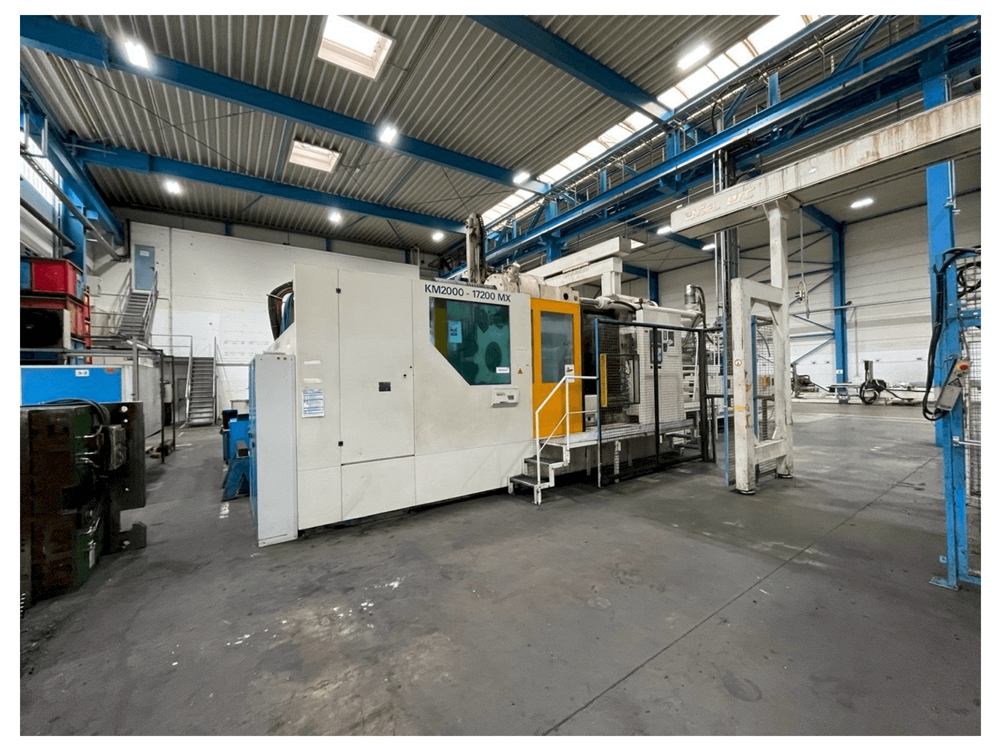 Вид станка Krauss Maffei KM 2000 17200 MX спереди