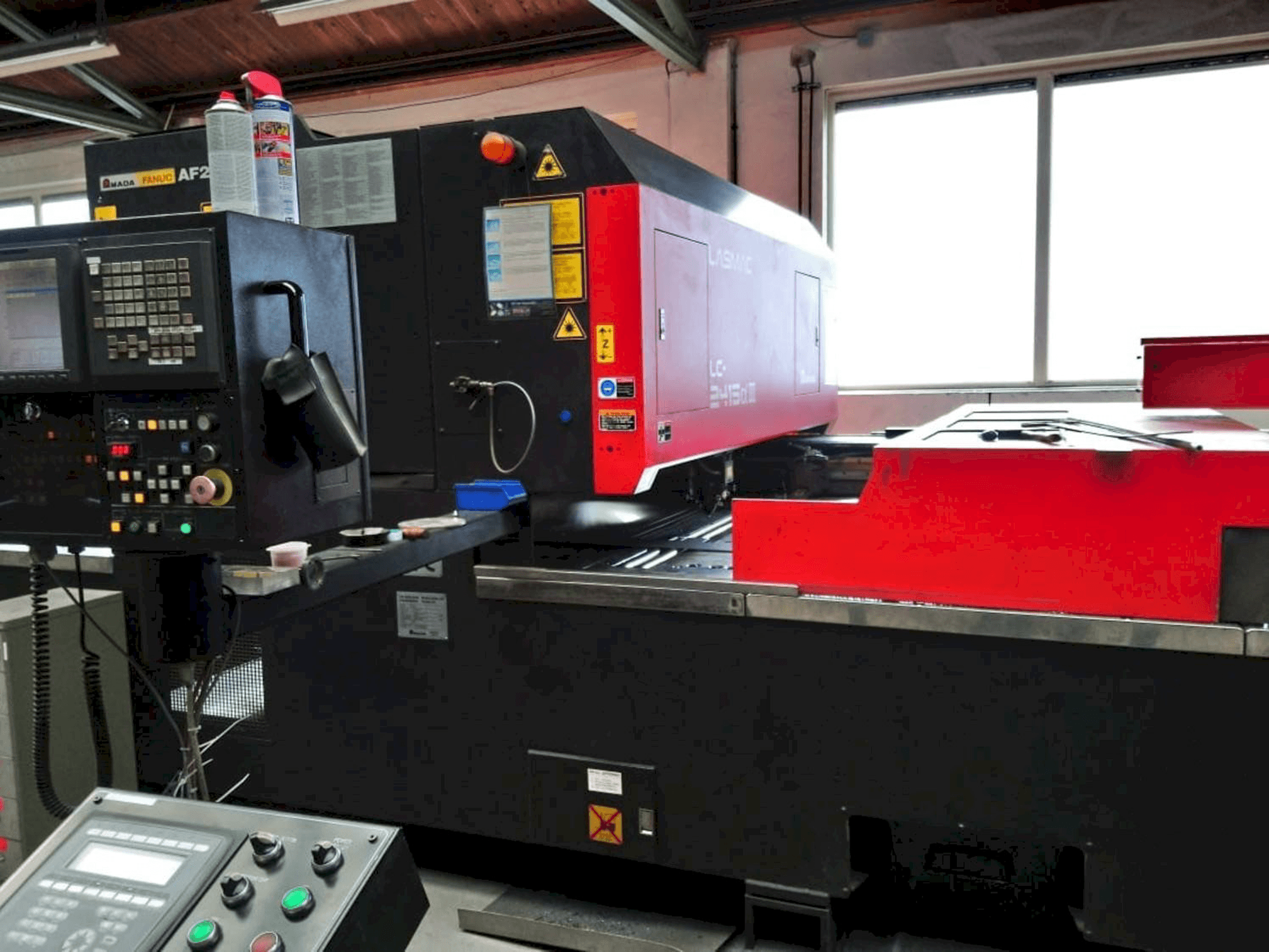 Front view of AMADA LC2415 ALPHA III machine