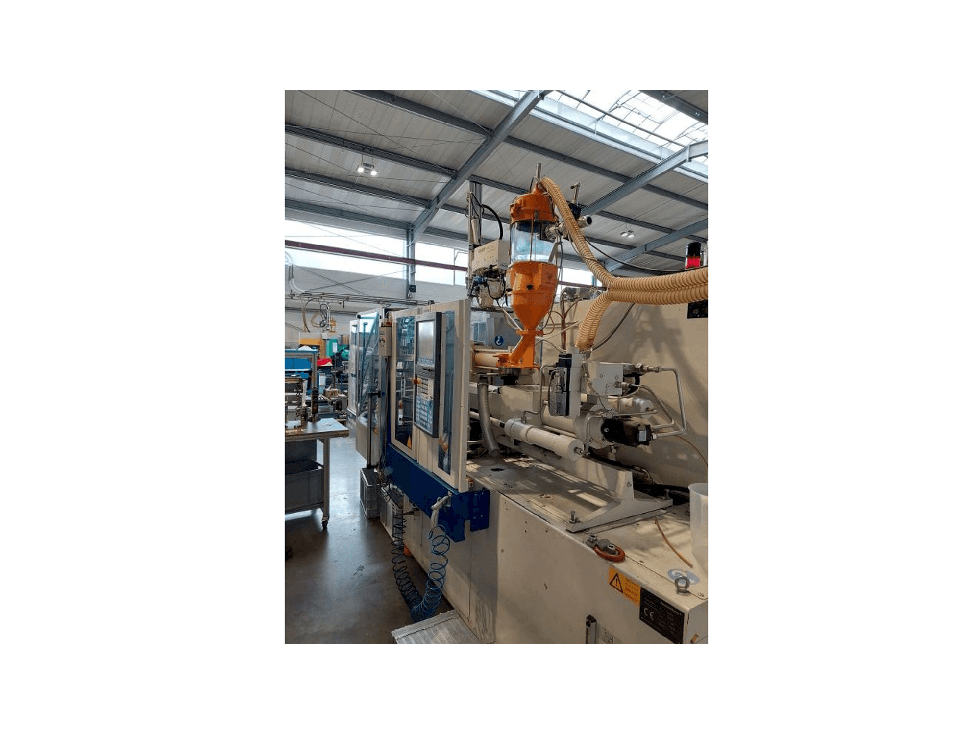 Вид станка Krauss Maffei 80-180 CX спереди