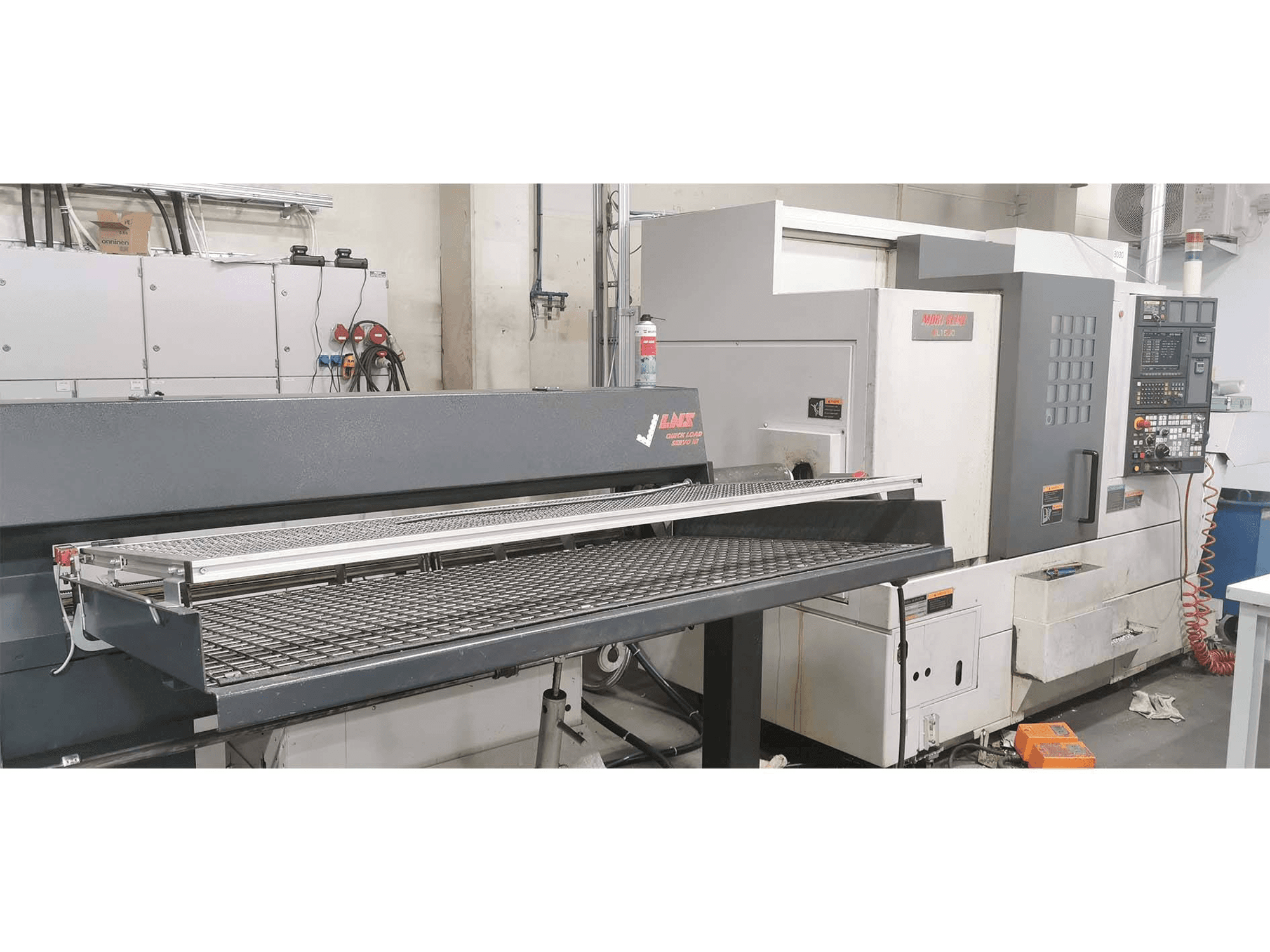 Вид станка MORI SEIKI NL 1500 MC 7500 спереди